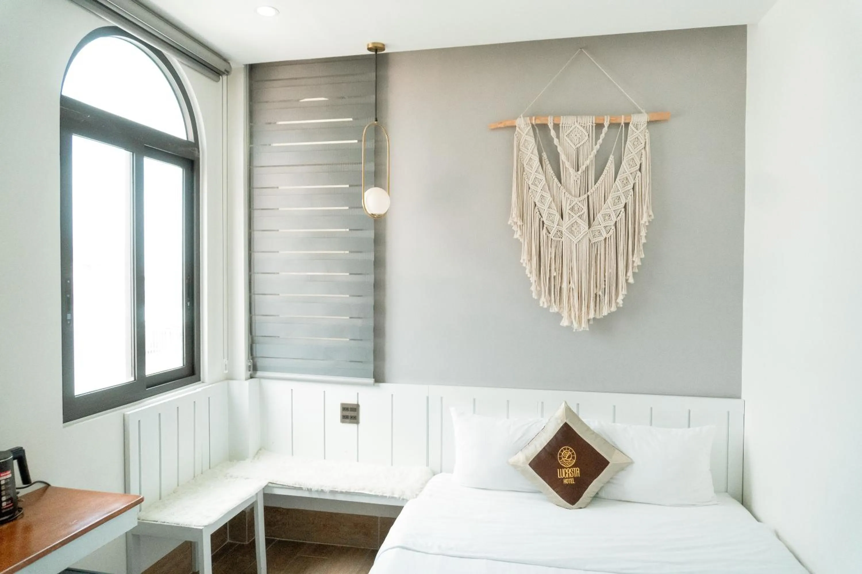 Bed in Lucasta Hotel