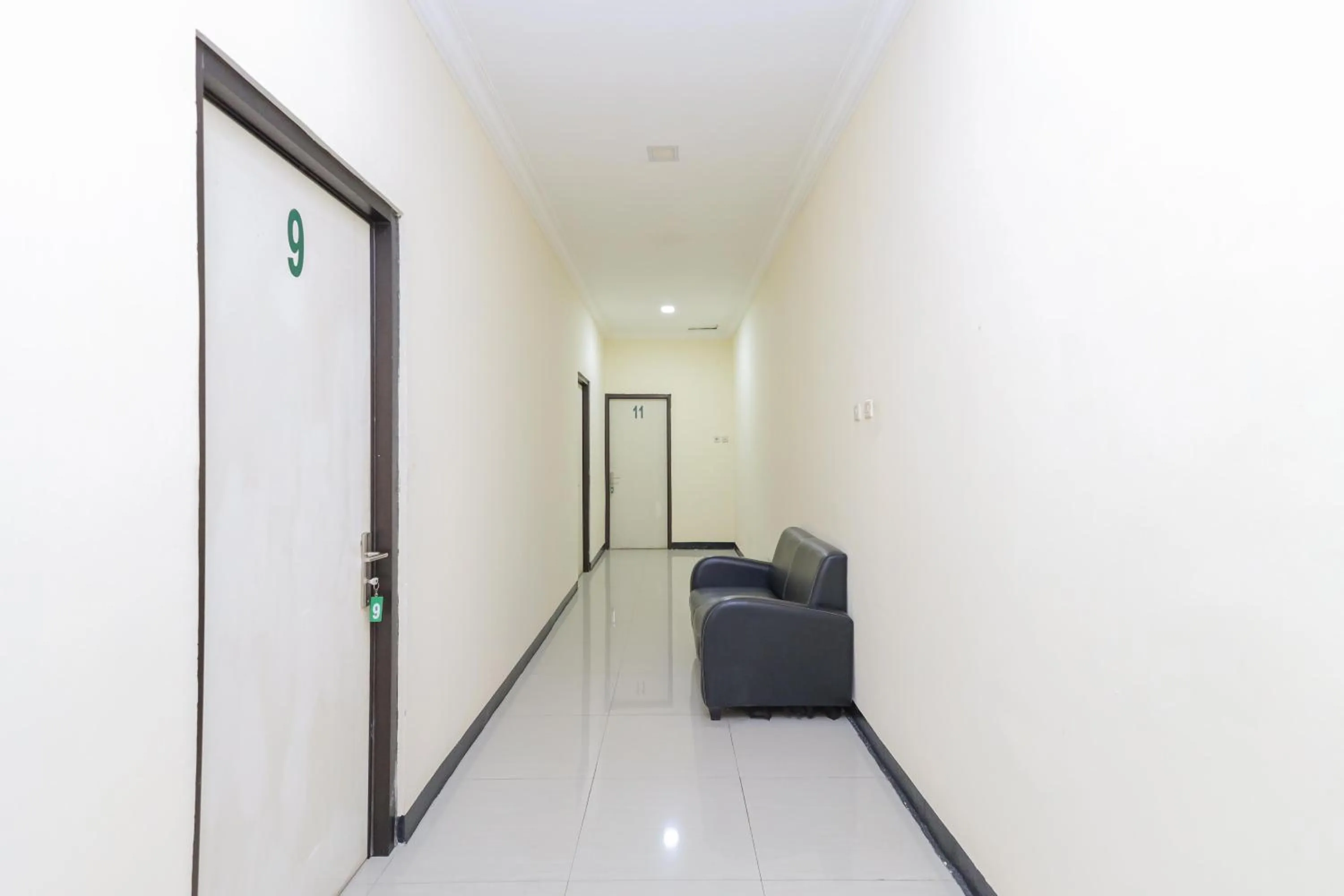 Living room in Urbanview Roemah Tebet by RedDoorz