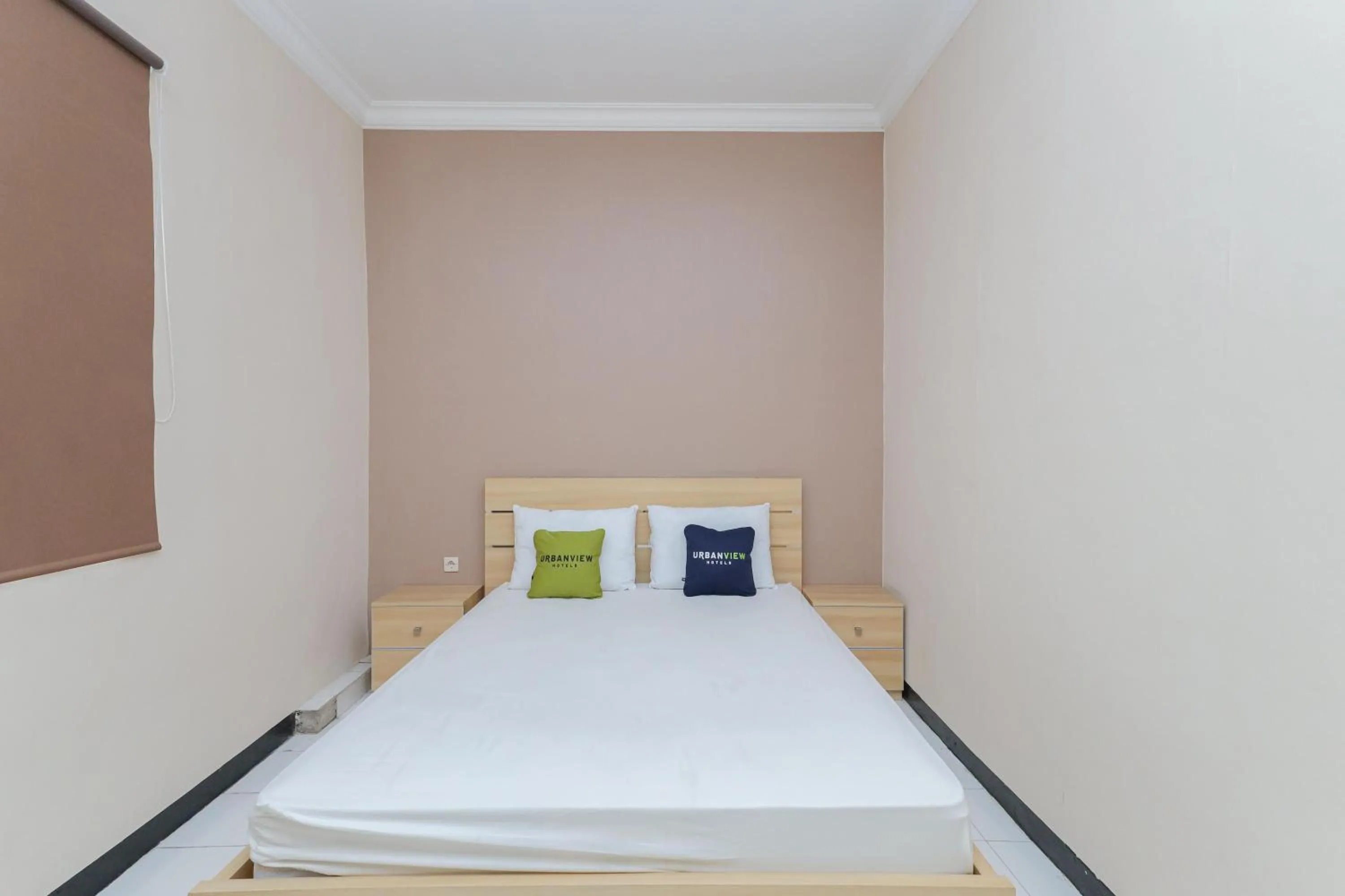 Bedroom, Bed in Urbanview Roemah Tebet by RedDoorz