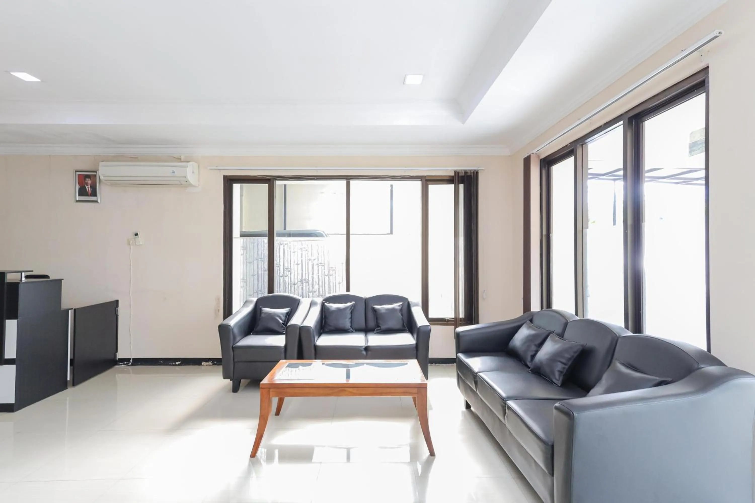 Living room in Urbanview Roemah Tebet by RedDoorz