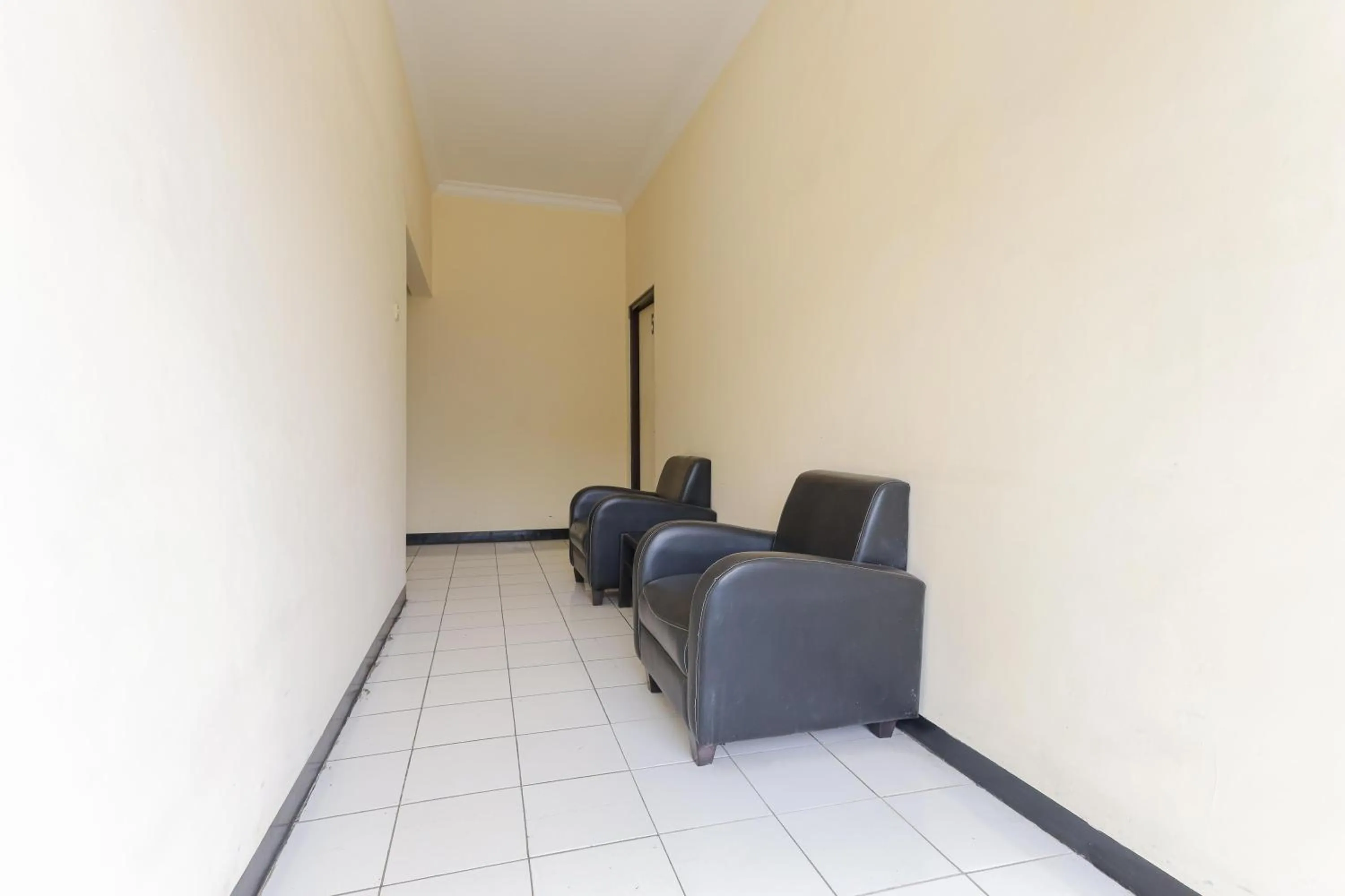 Living room in Urbanview Roemah Tebet by RedDoorz