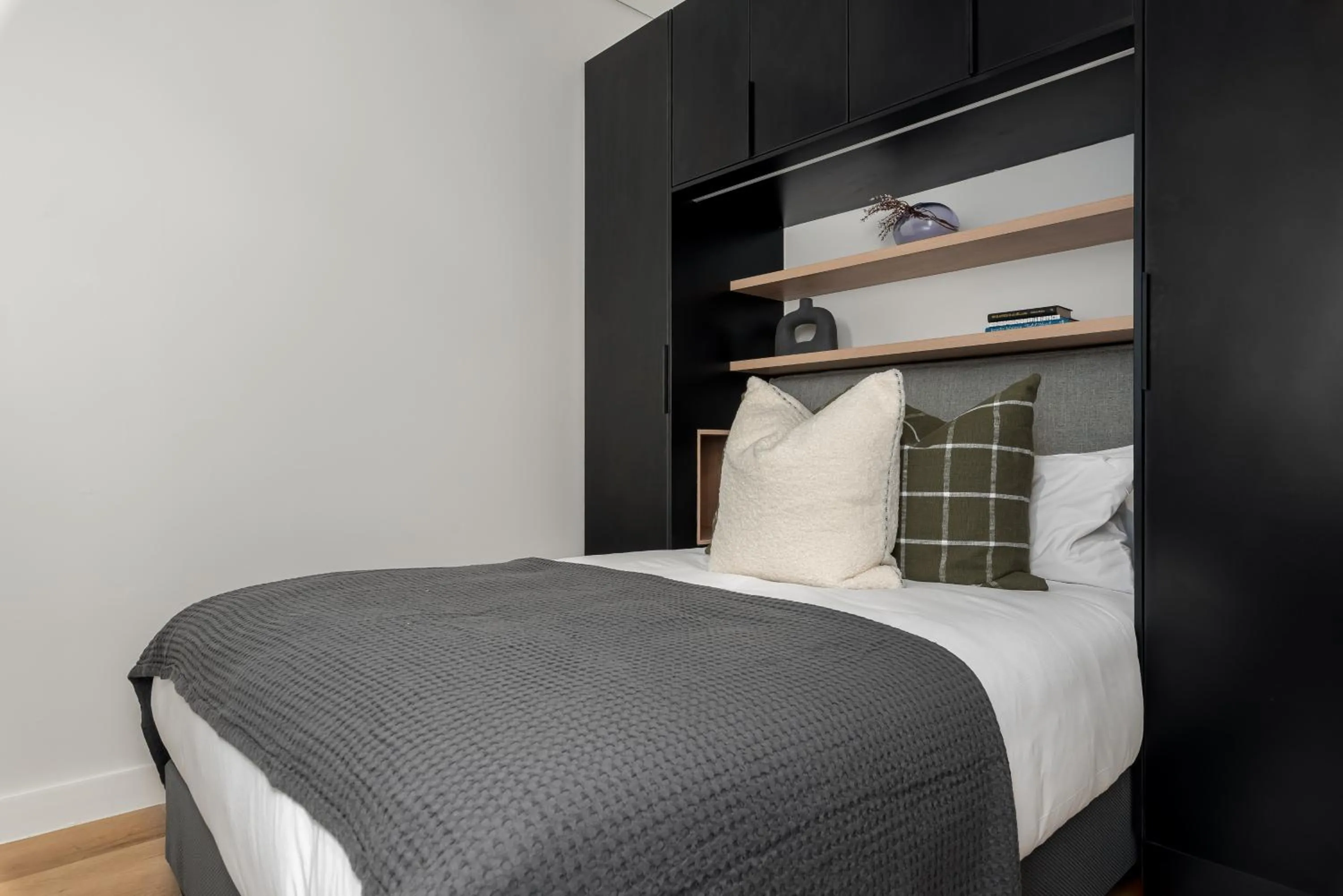 Bed in The Carrington Luxury Apartments