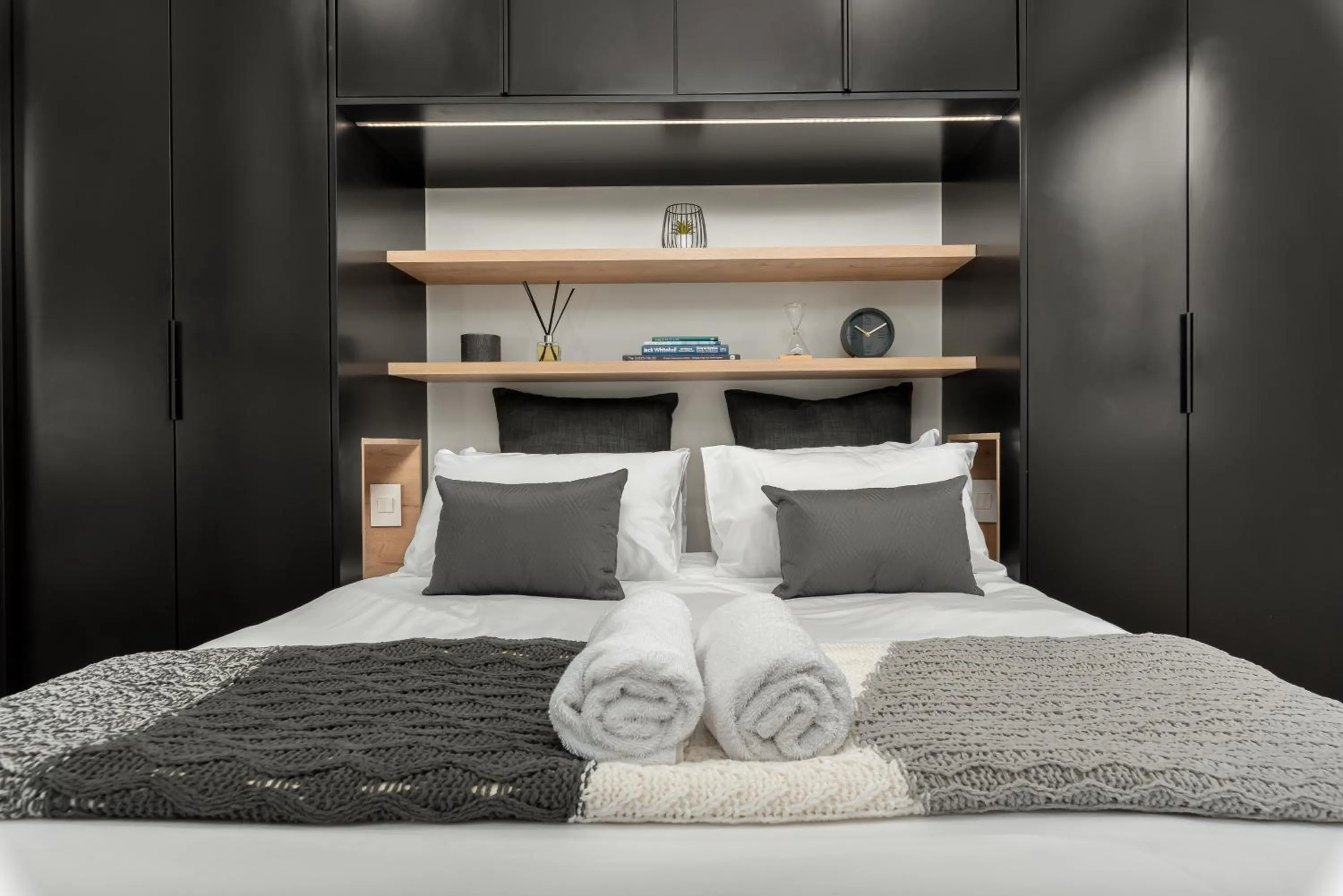 Bed in The Carrington Luxury Apartments