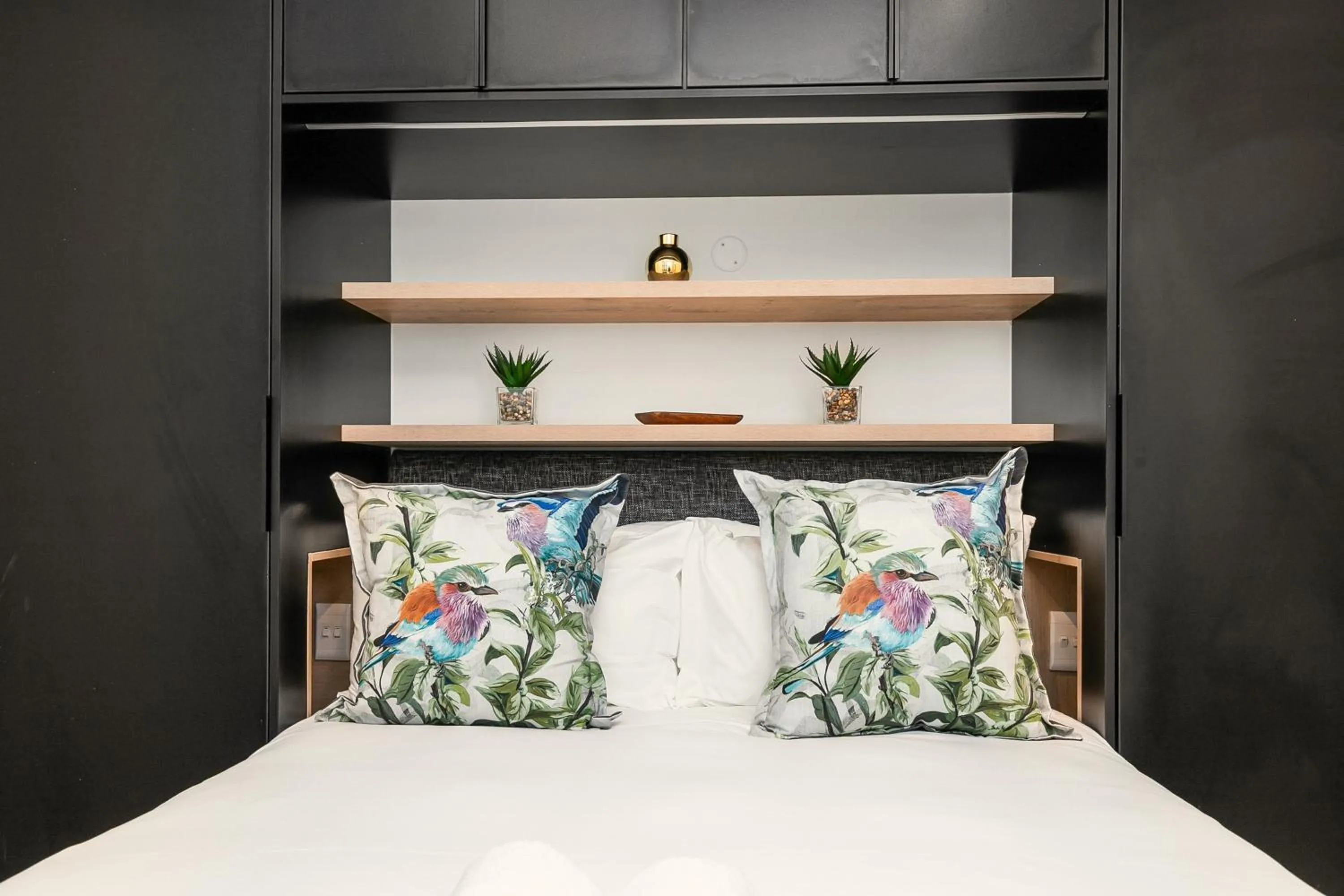 Bed in The Carrington Luxury Apartments