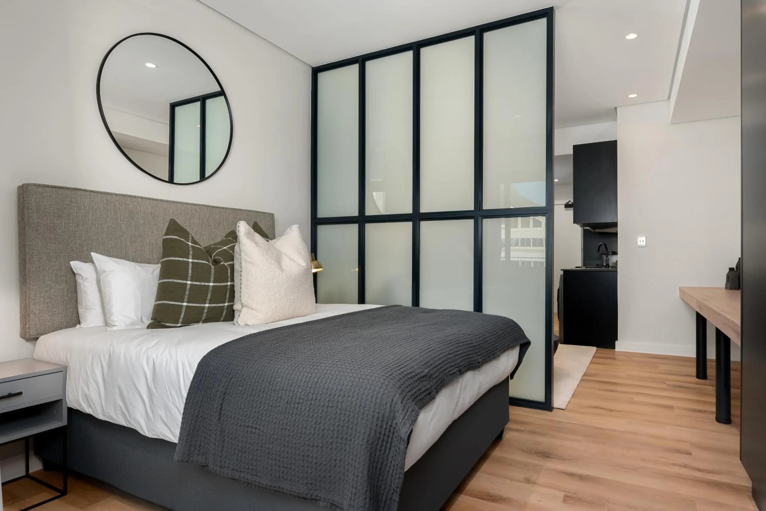Bed in The Carrington Luxury Apartments