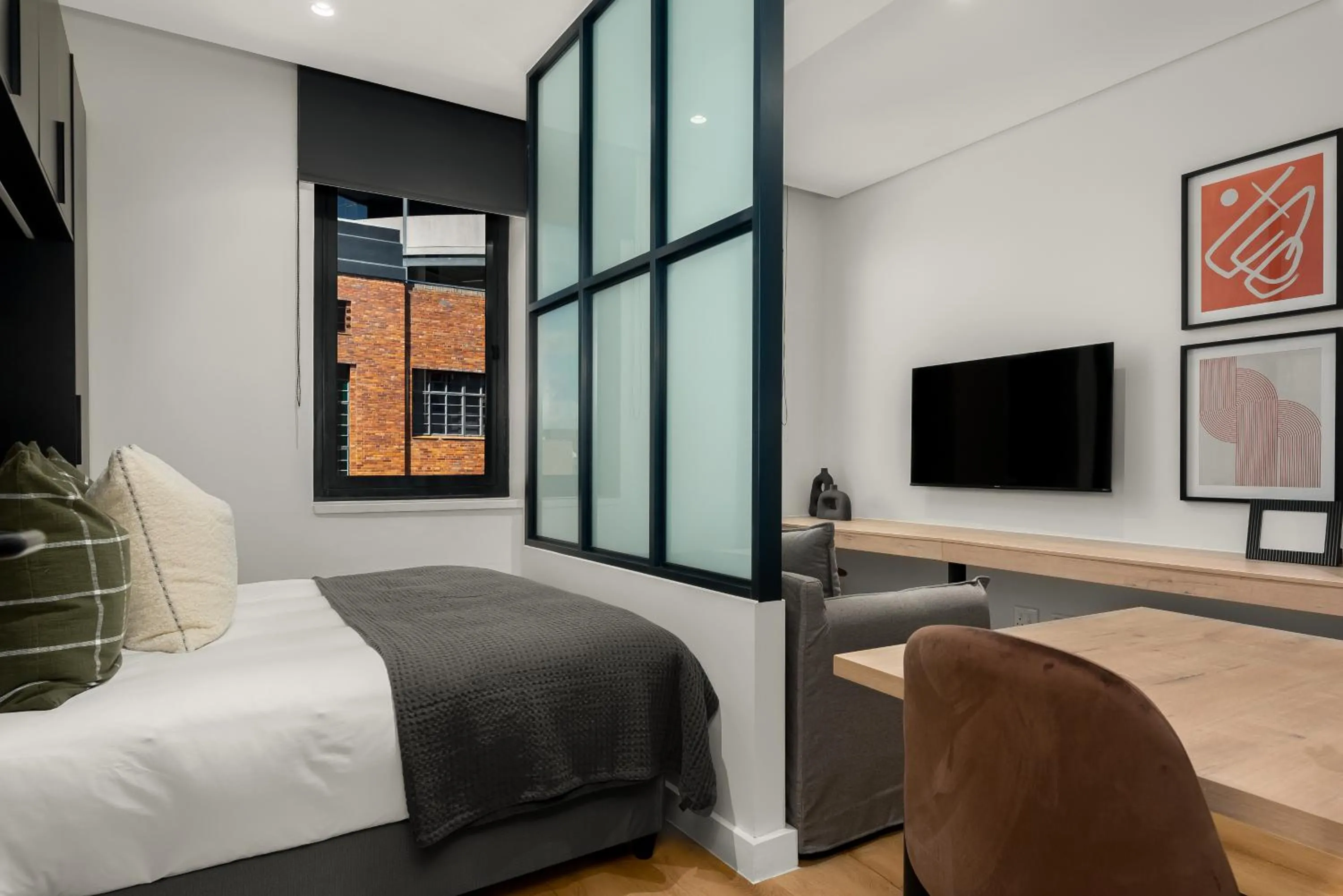 Bed in The Carrington Luxury Apartments