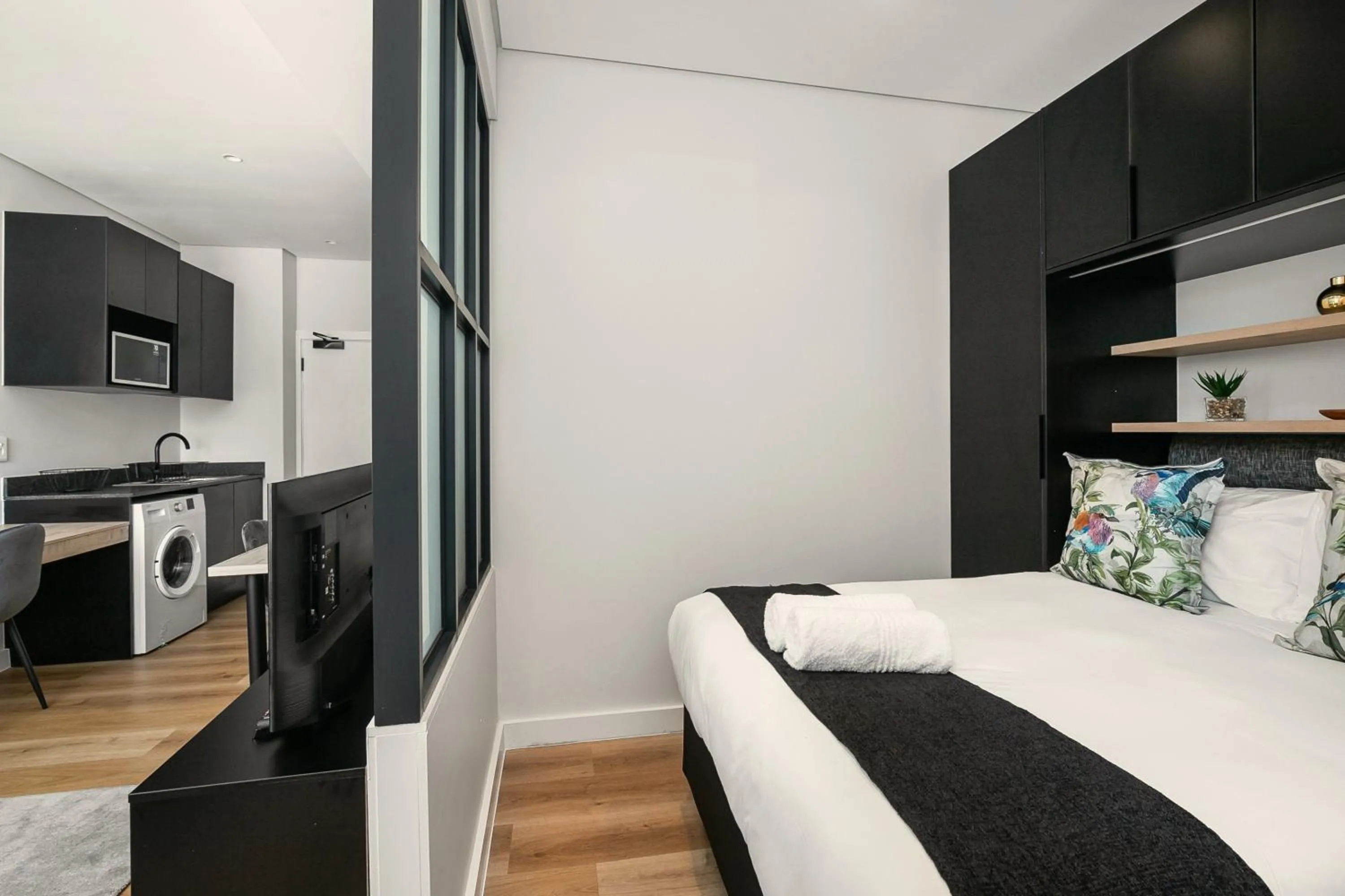 Bed in The Carrington Luxury Apartments