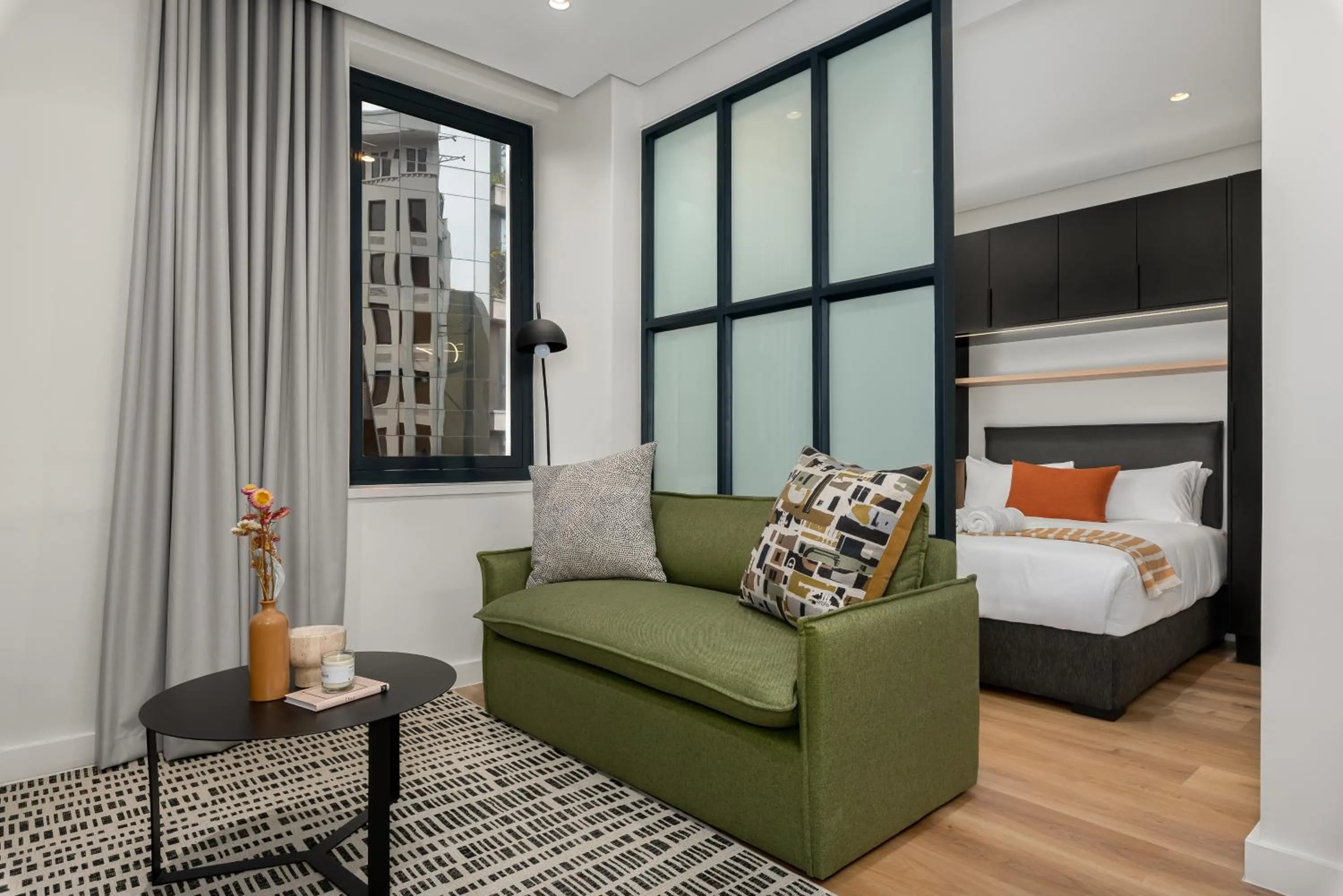 Bed in The Carrington Luxury Apartments