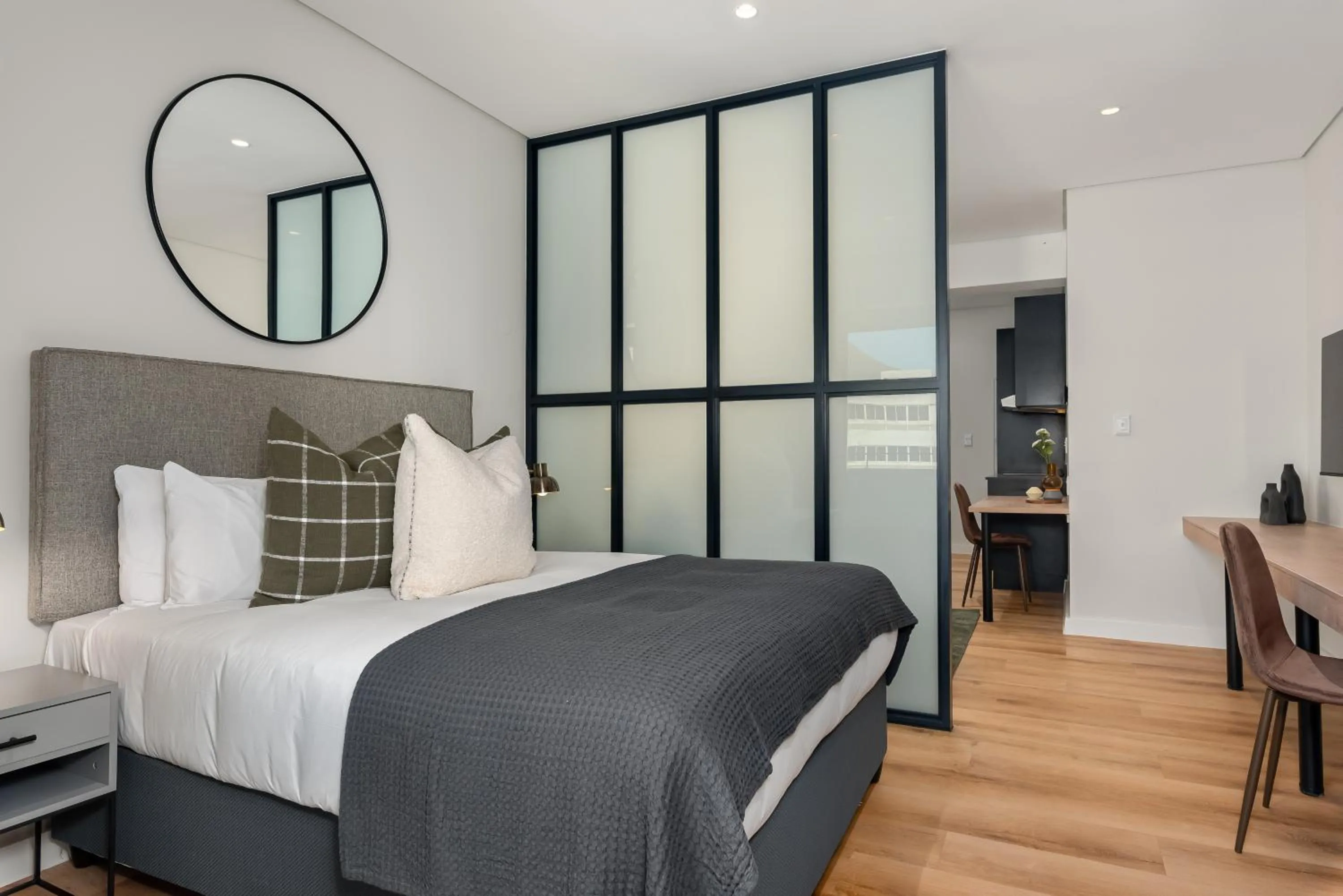 Bed in The Carrington Luxury Apartments