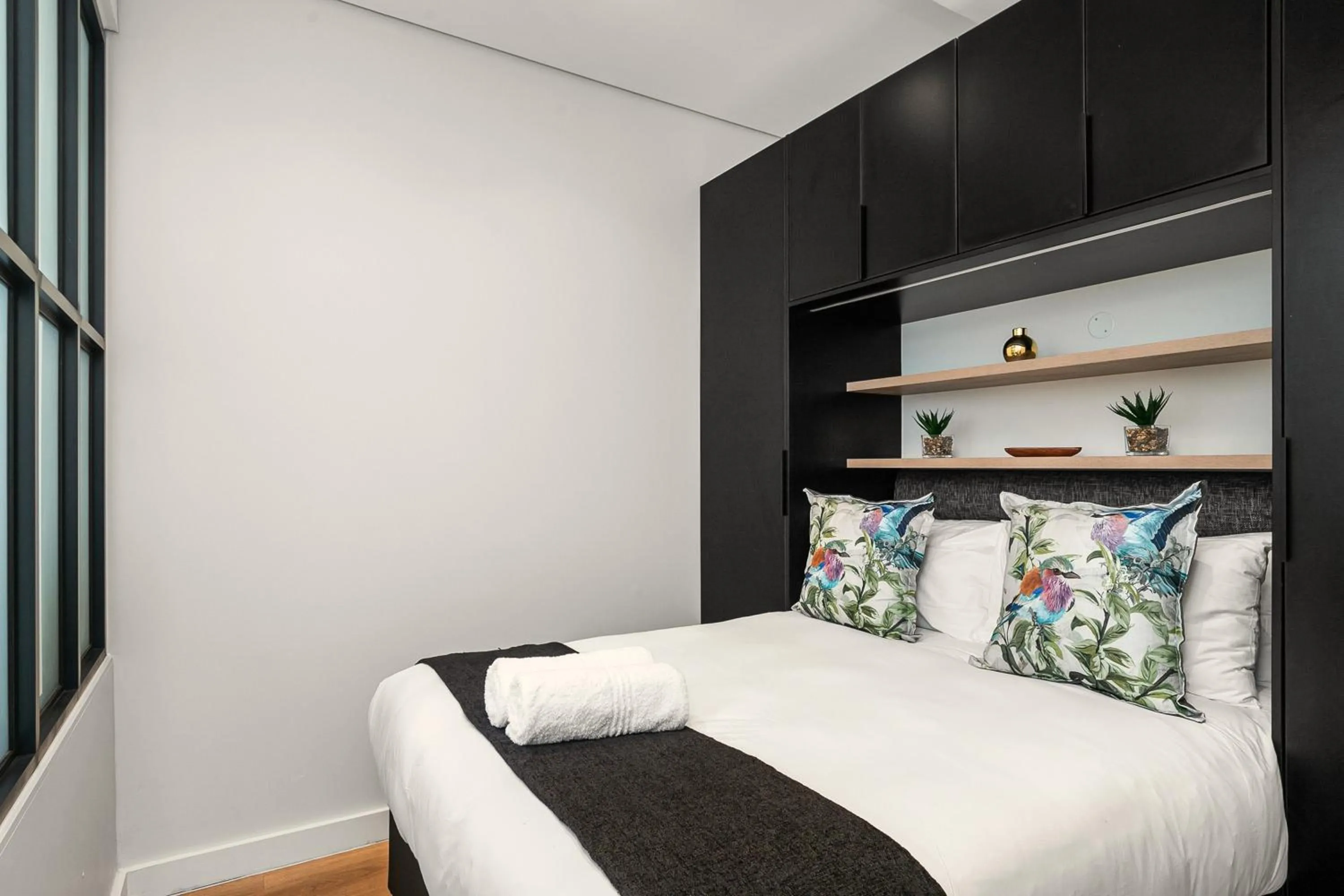 Bed in The Carrington Luxury Apartments