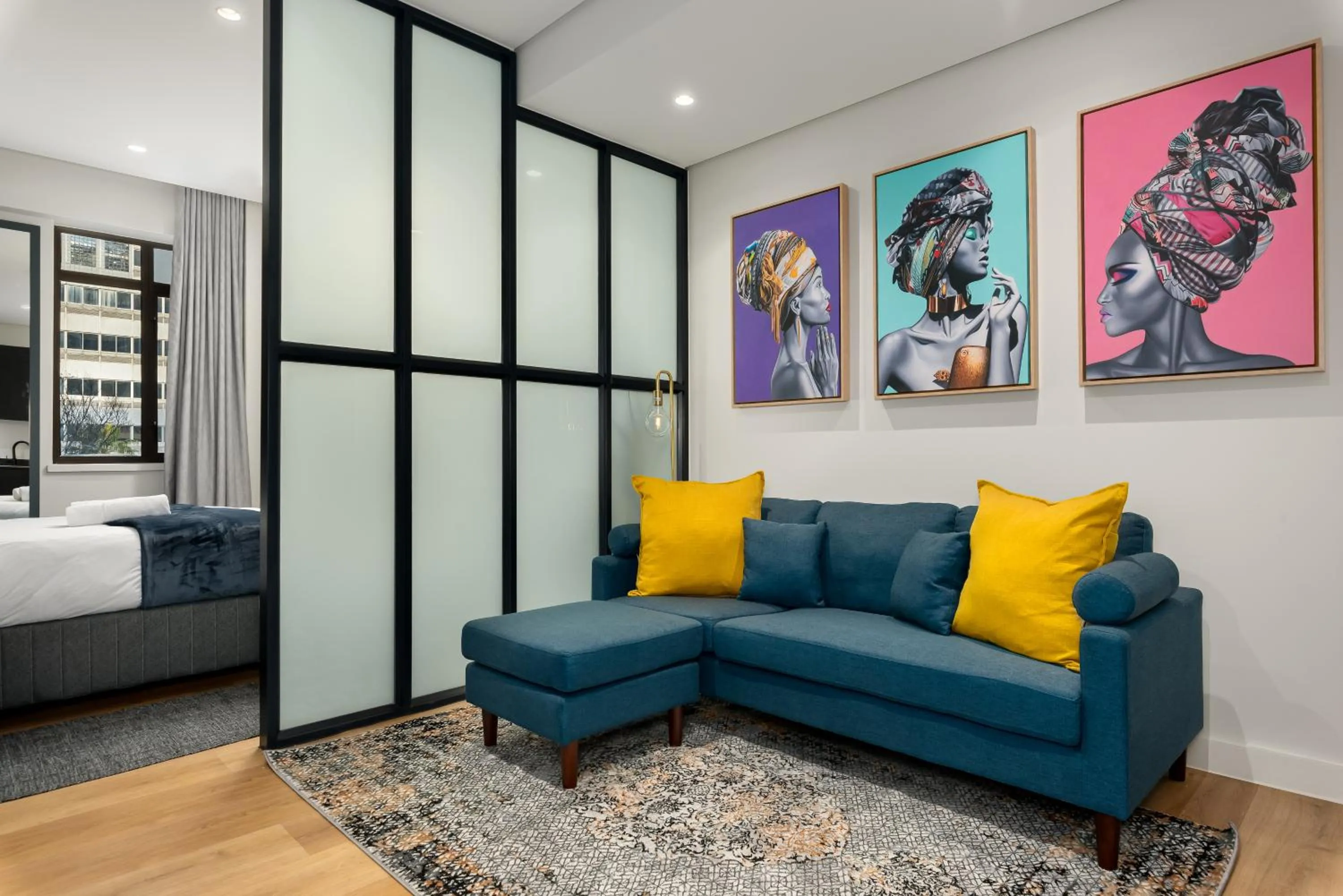 Bed in The Carrington Luxury Apartments