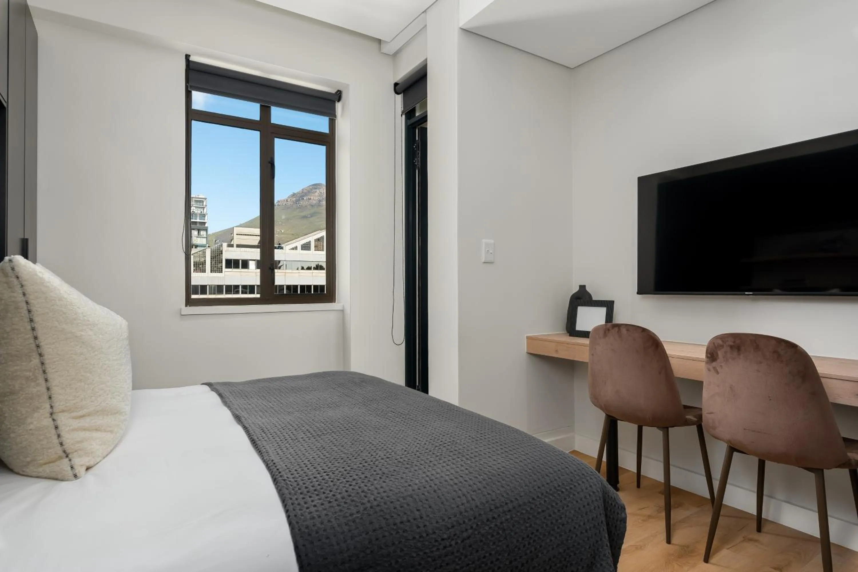 Bed in The Carrington Luxury Apartments