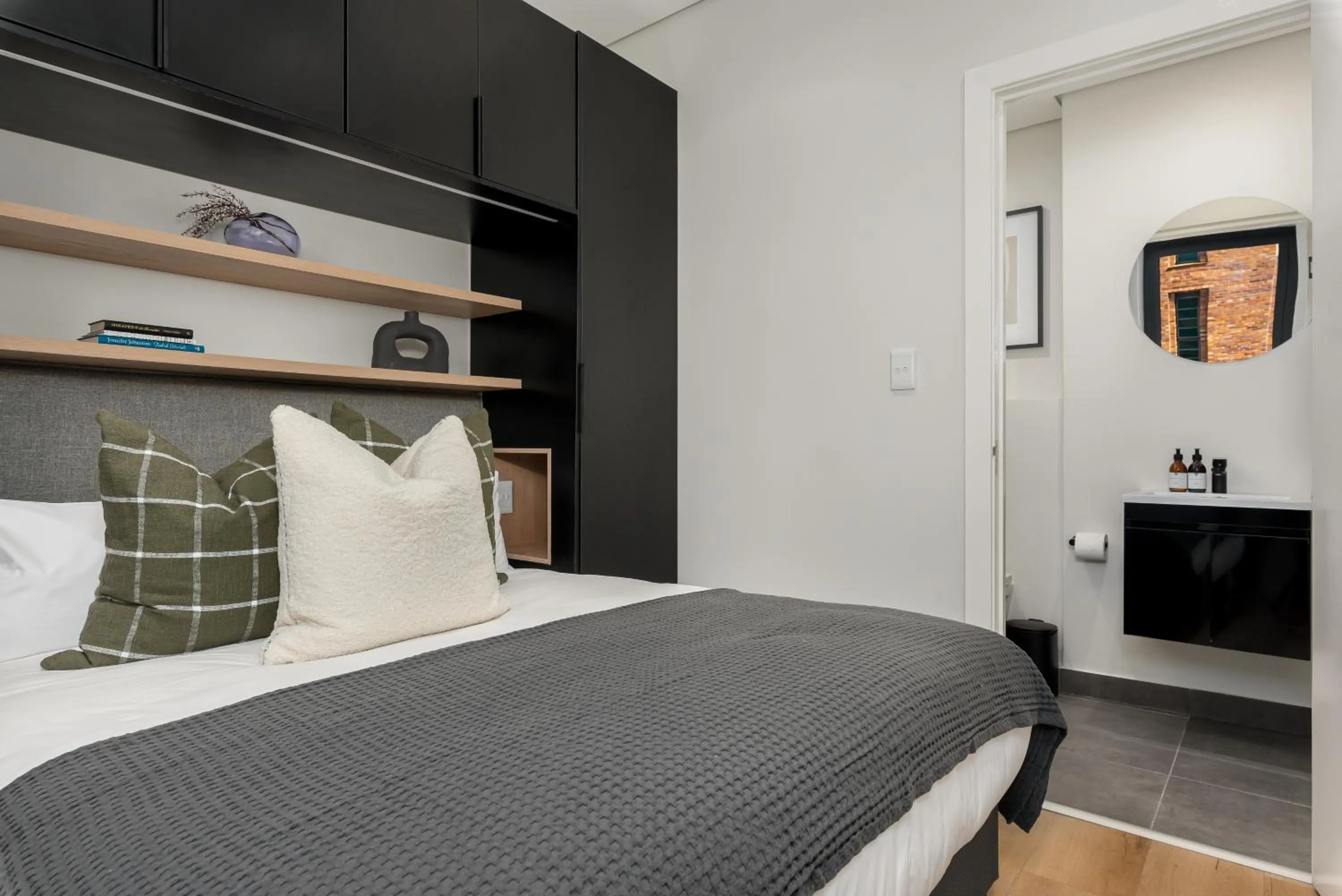 Bed in The Carrington Luxury Apartments