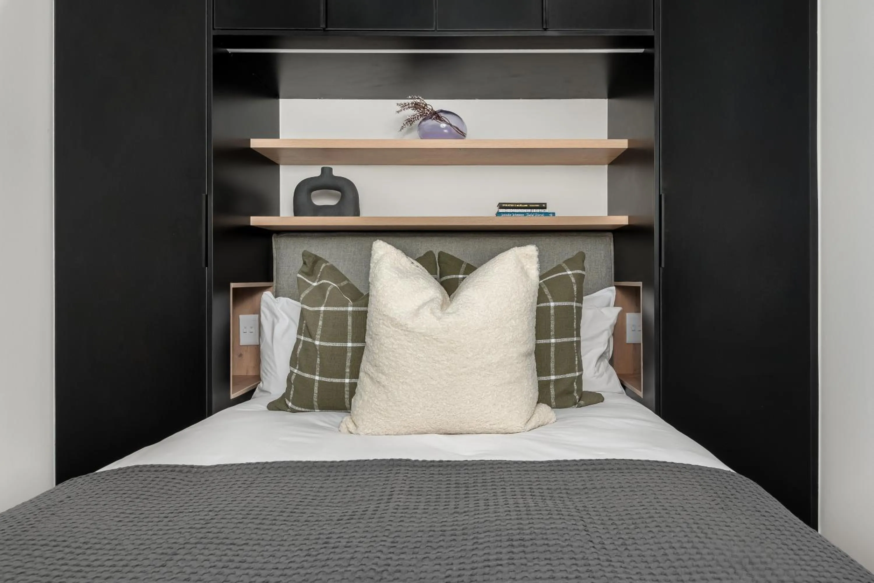 Bed in The Carrington Luxury Apartments