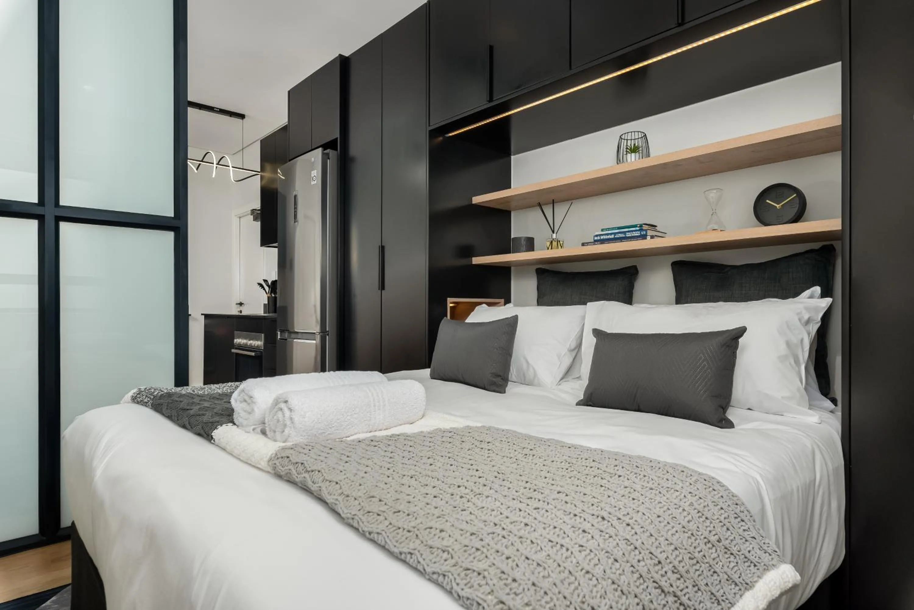 Bed in The Carrington Luxury Apartments