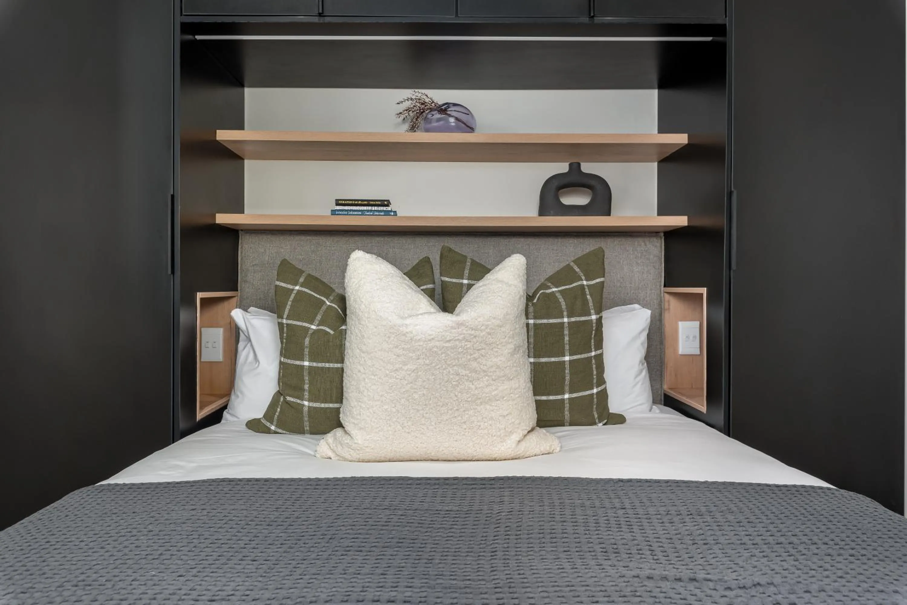 Bed in The Carrington Luxury Apartments