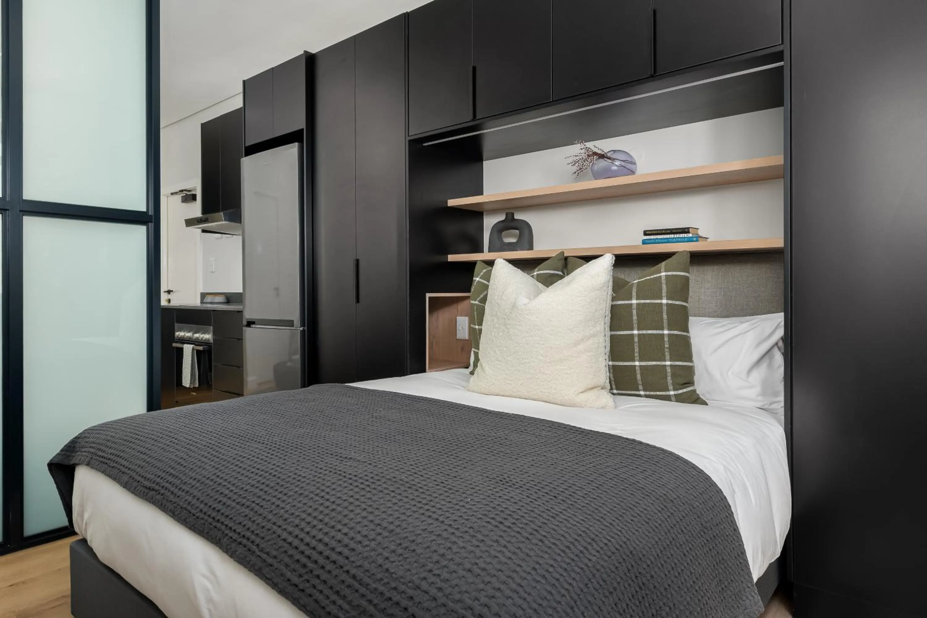 Bed in The Carrington Luxury Apartments