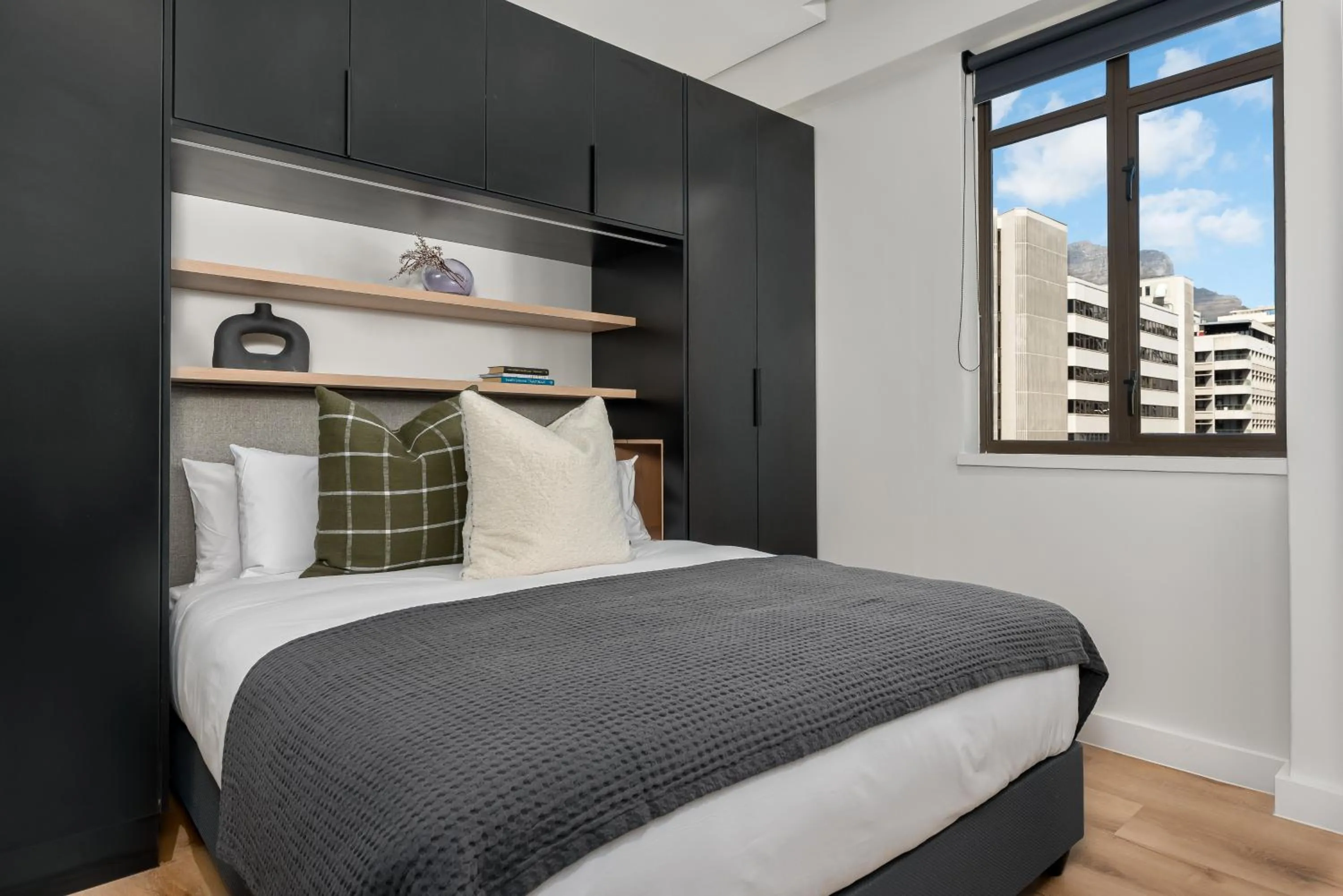 Bed in The Carrington Luxury Apartments