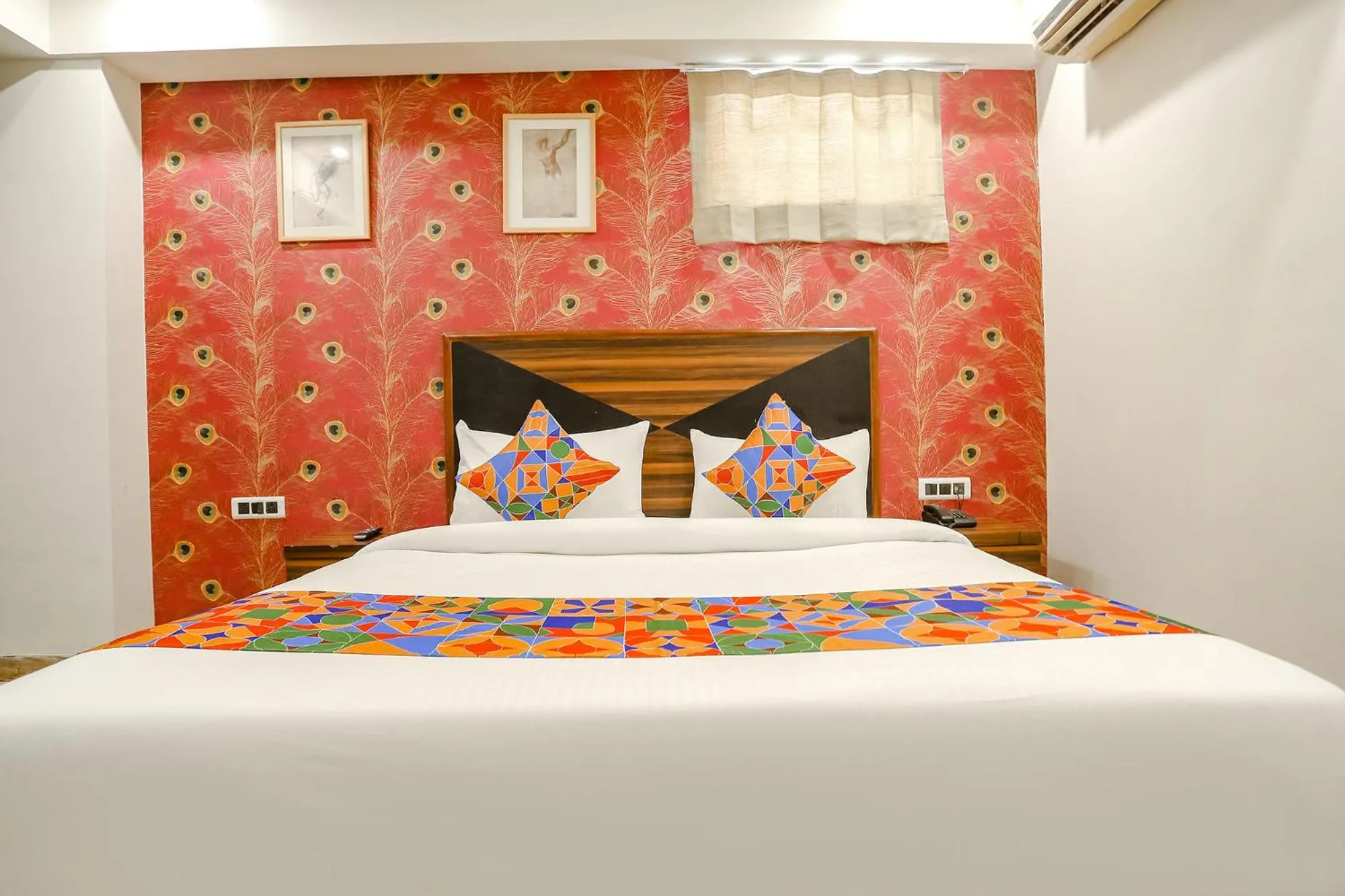 Bed in FabHotel Delta Suites I