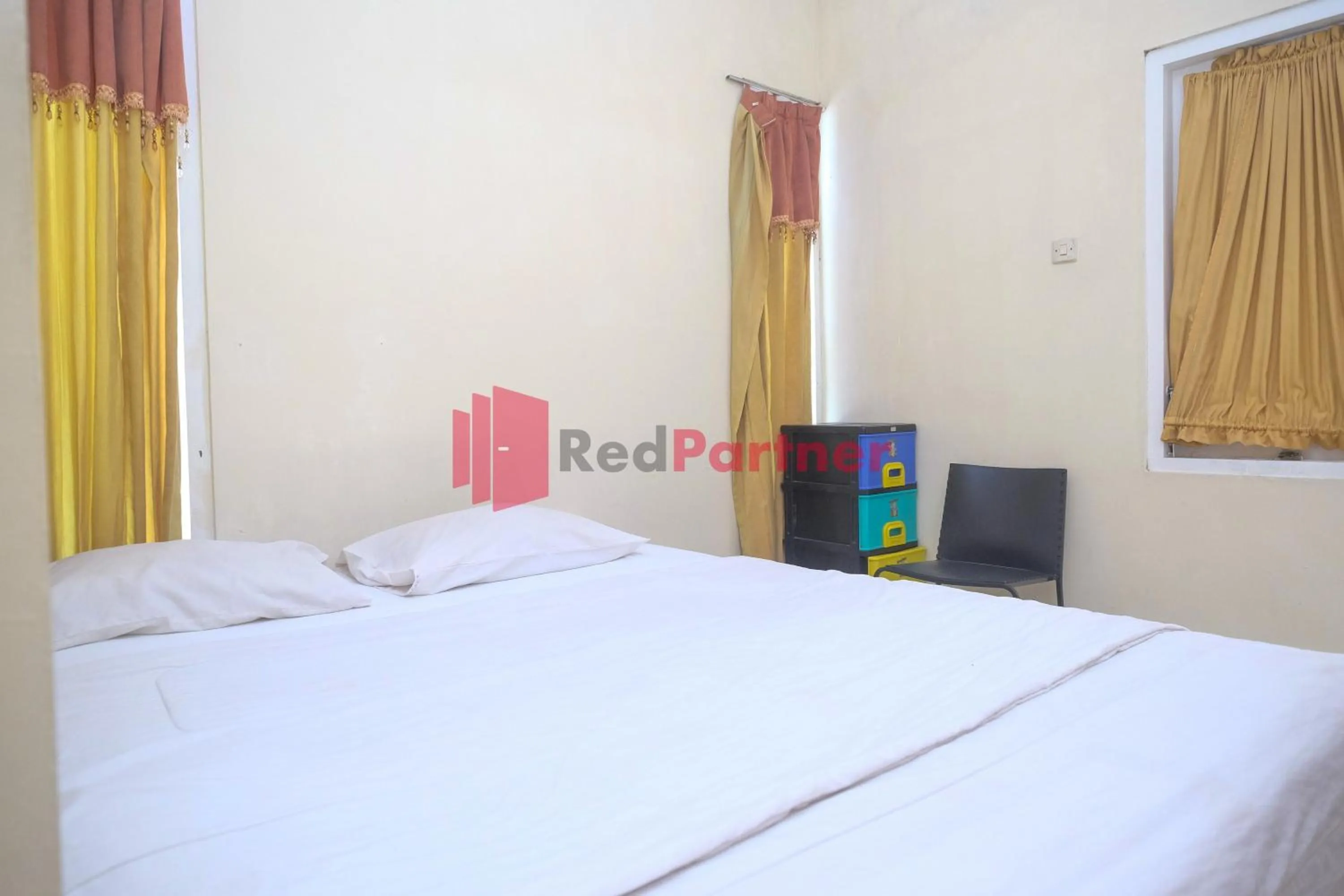 Bed in Wisma Fortuna Syariah Mitra RedDoorz