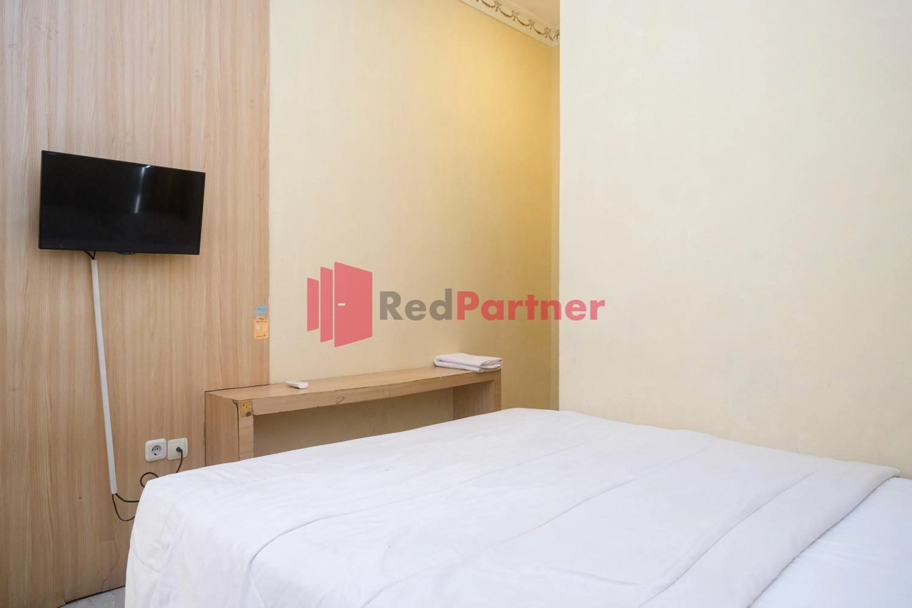 Bed in Wisma Fortuna Syariah Mitra RedDoorz
