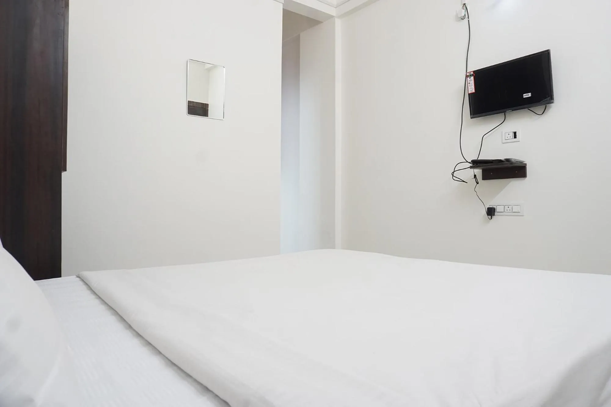 Communal lounge/ TV room, Bed in FabHotel Gargi Galuxe - Nr Ankushrao Natyagruha