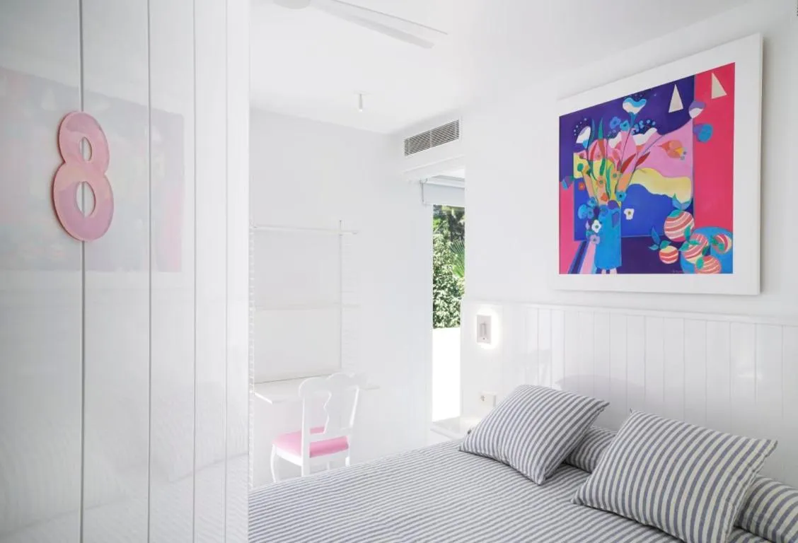 Bed in The Pink Elephant Hotel