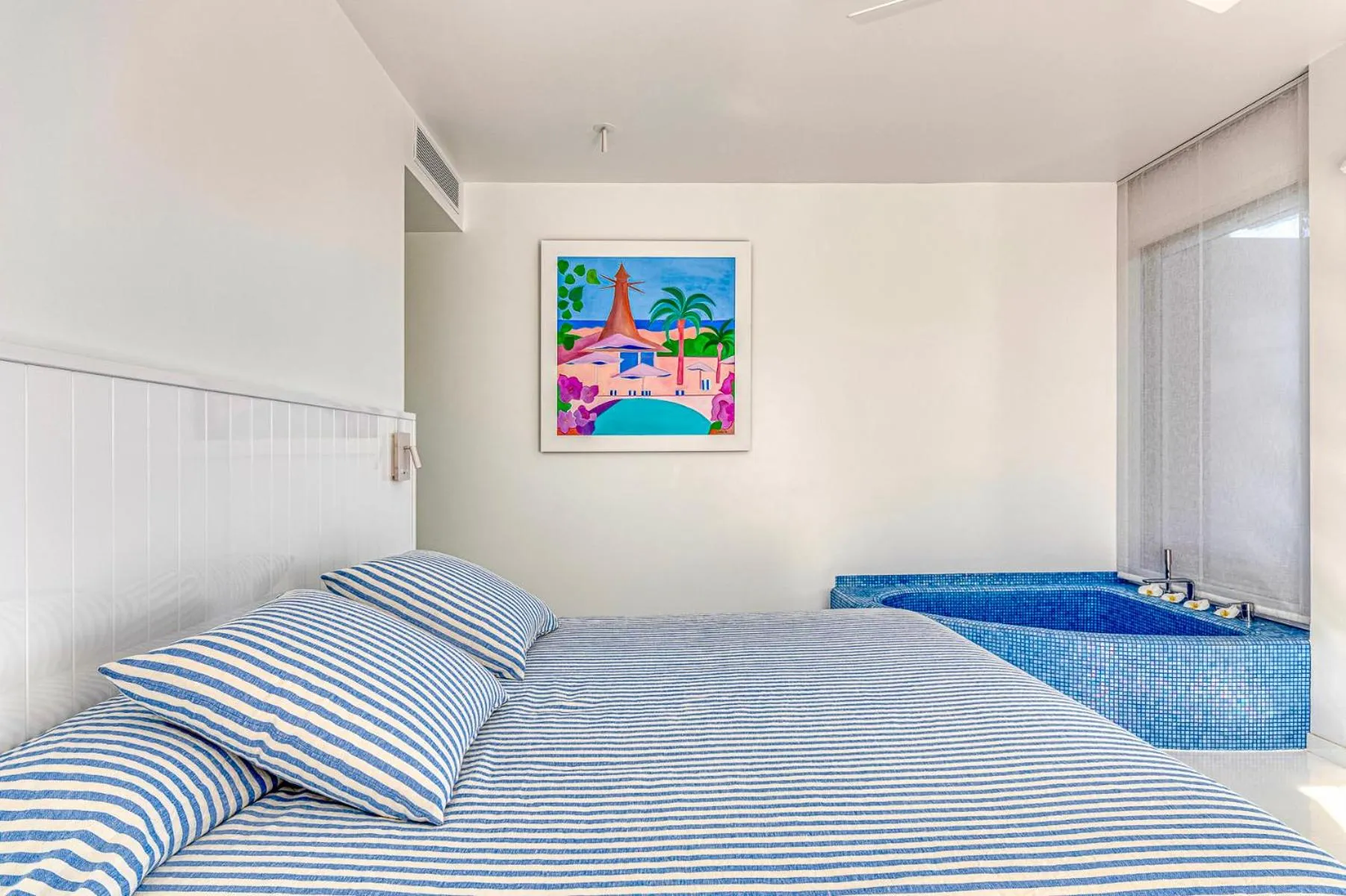 Bed in The Pink Elephant Hotel