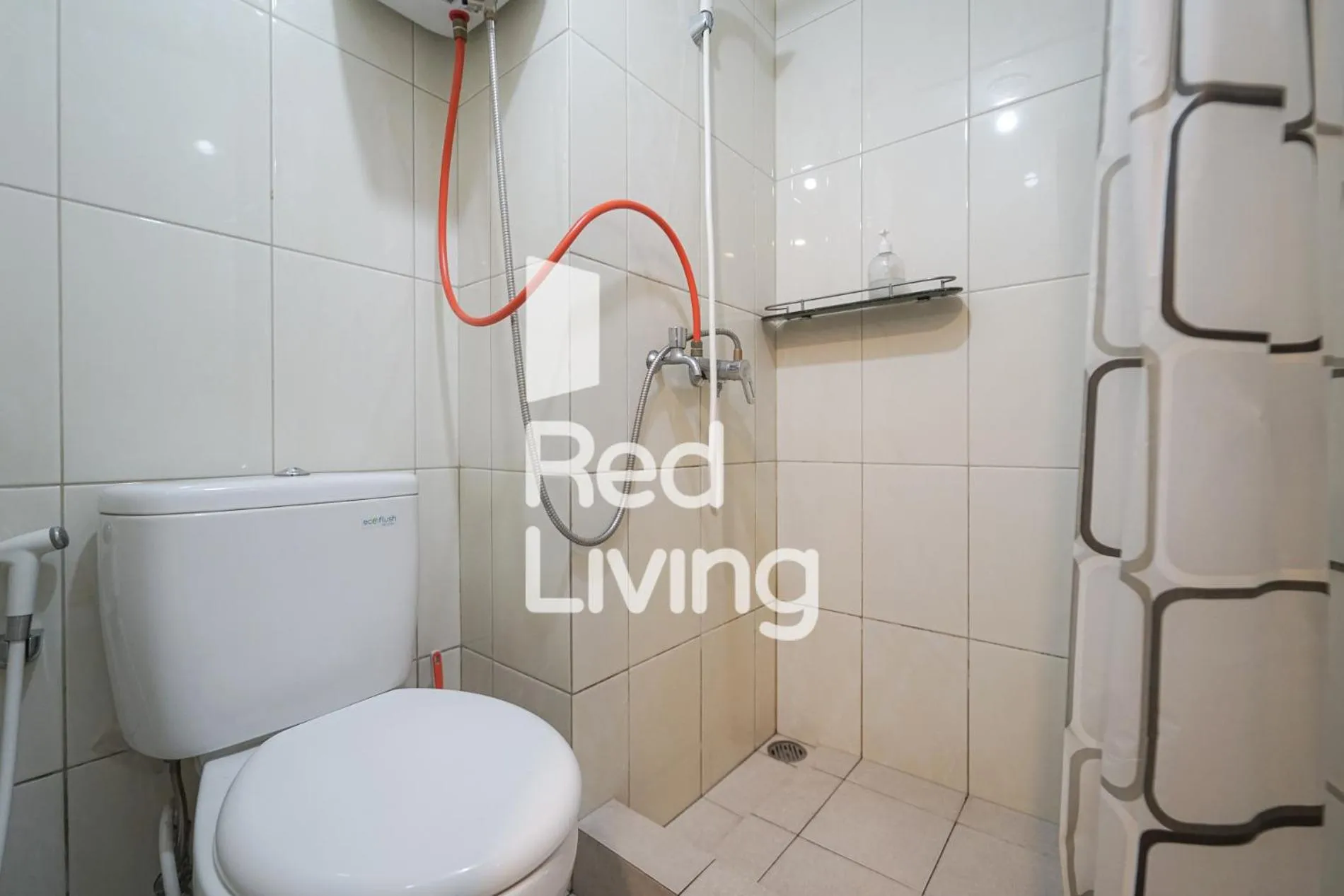 Bathroom in Redliving Apartemen Springlake Summarecon - MDH Rooms Tower Caldesia with Netflix