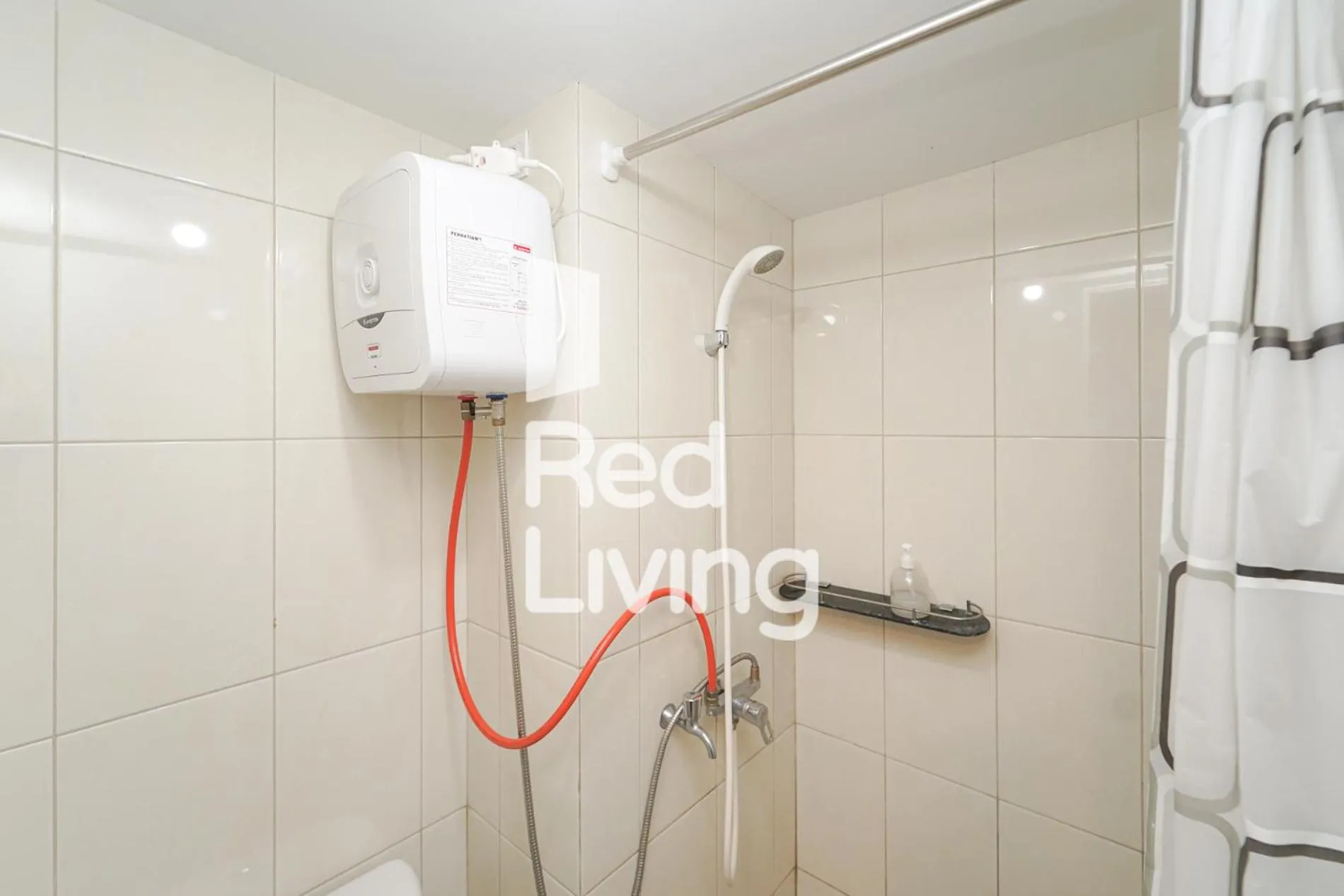 Bathroom in Redliving Apartemen Springlake Summarecon - MDH Rooms Tower Caldesia with Netflix