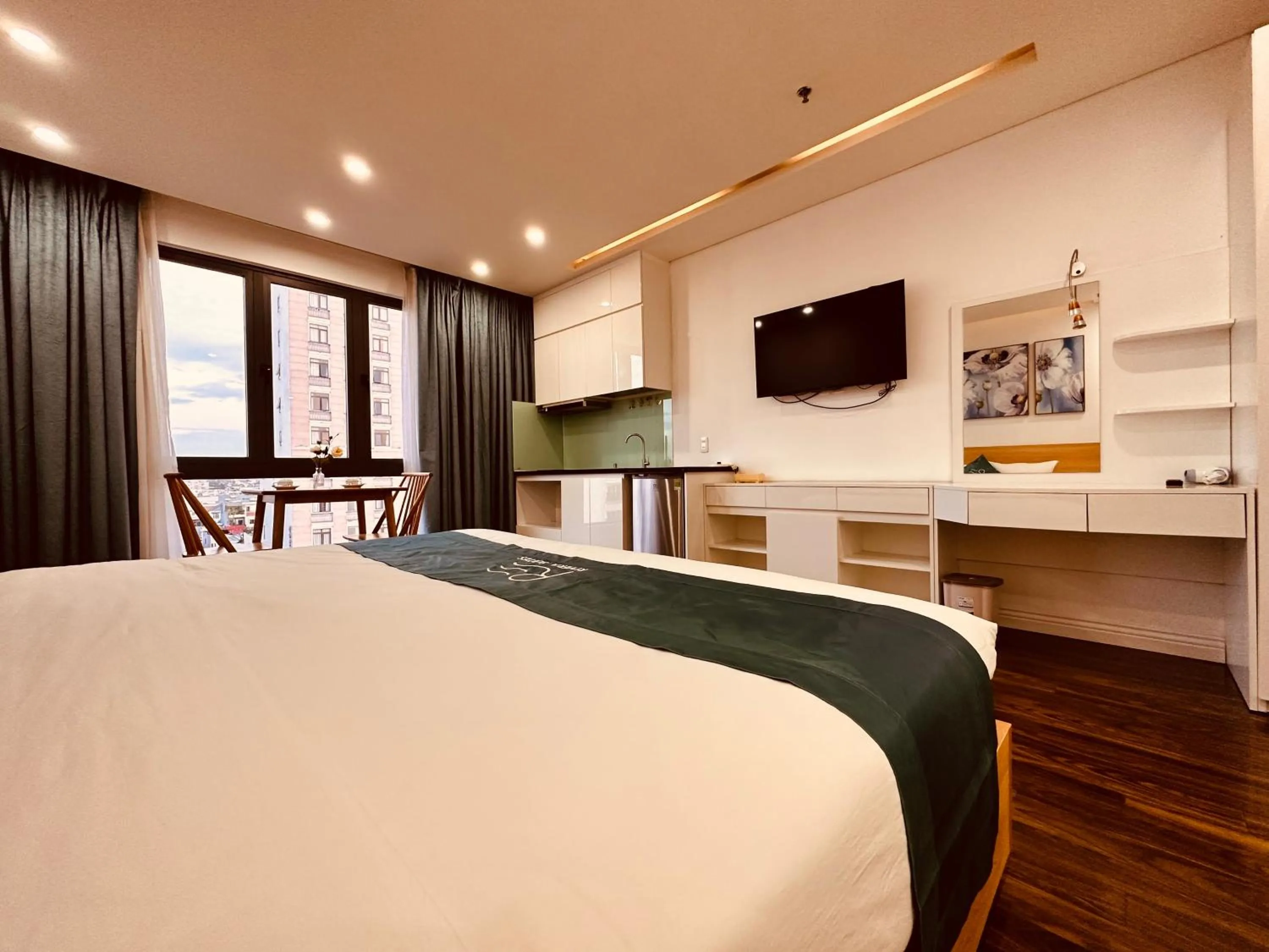 Bed in Rivera Suites