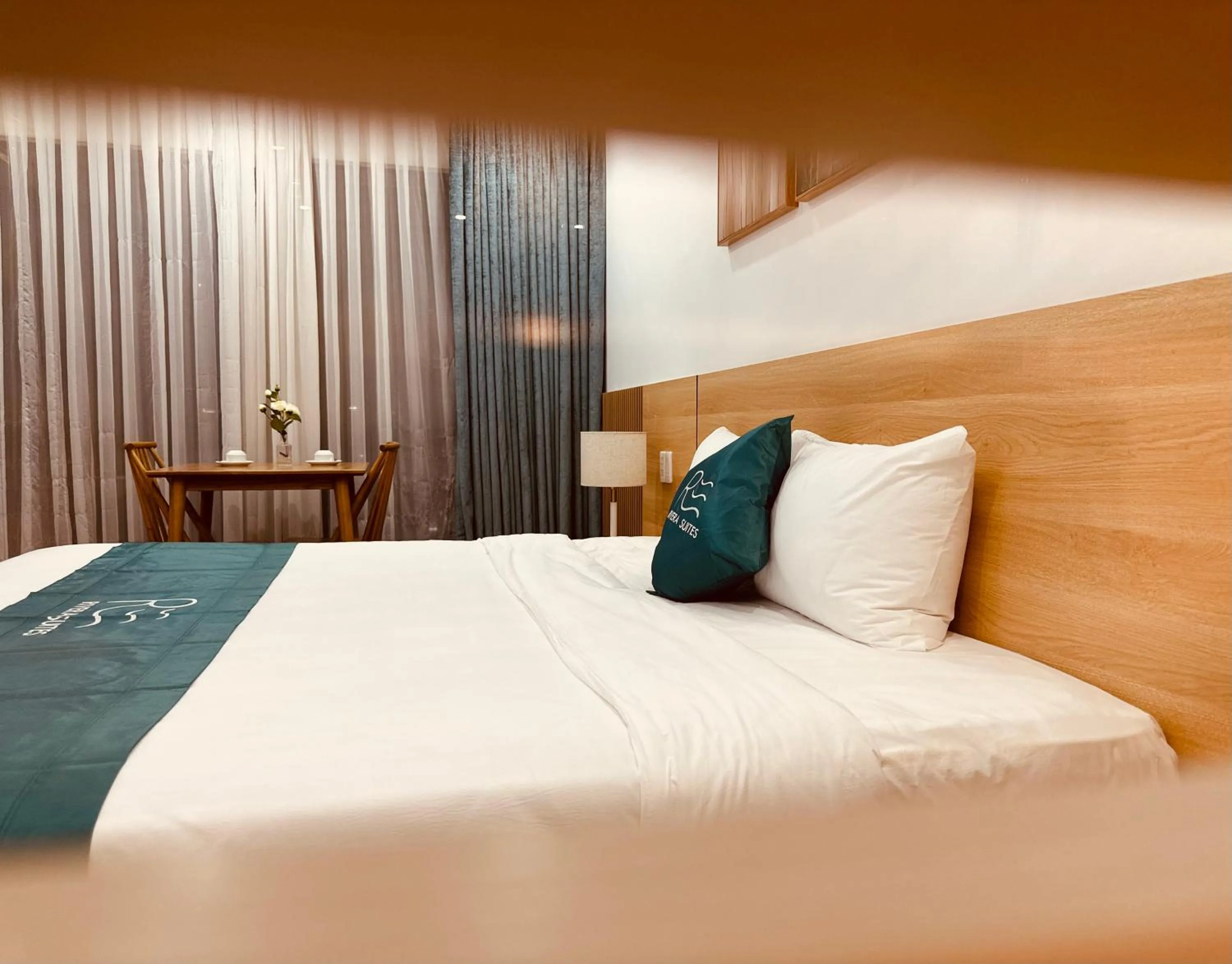 Bed in Rivera Suites