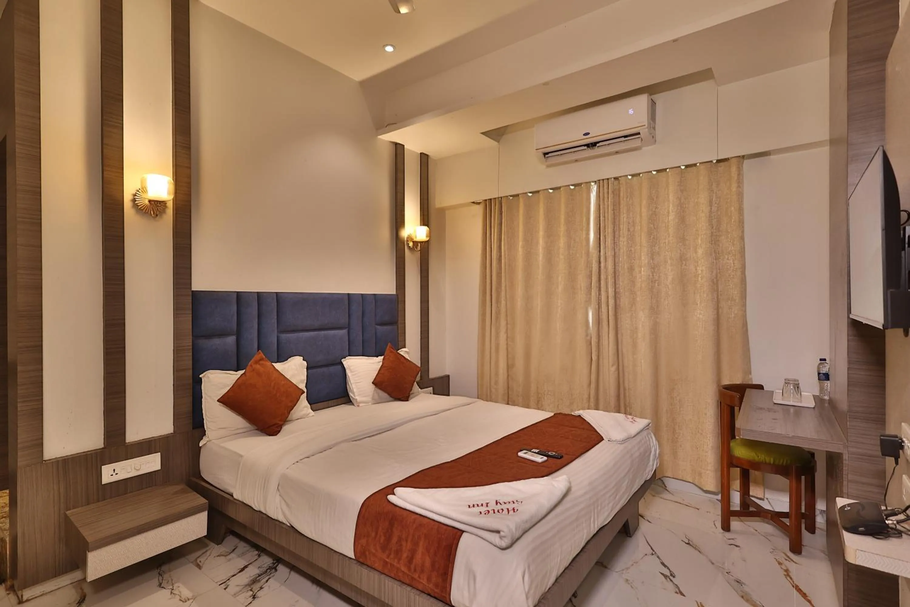 Bed in HOTEL STAY INN