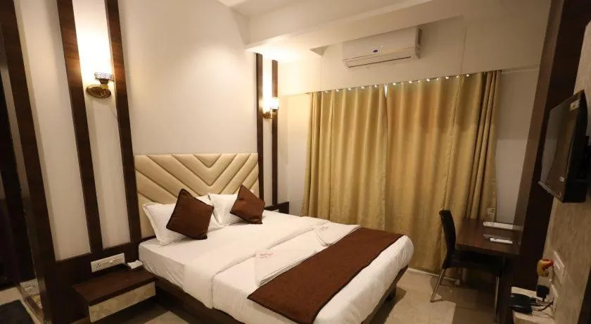 Bed in HOTEL STAY INN