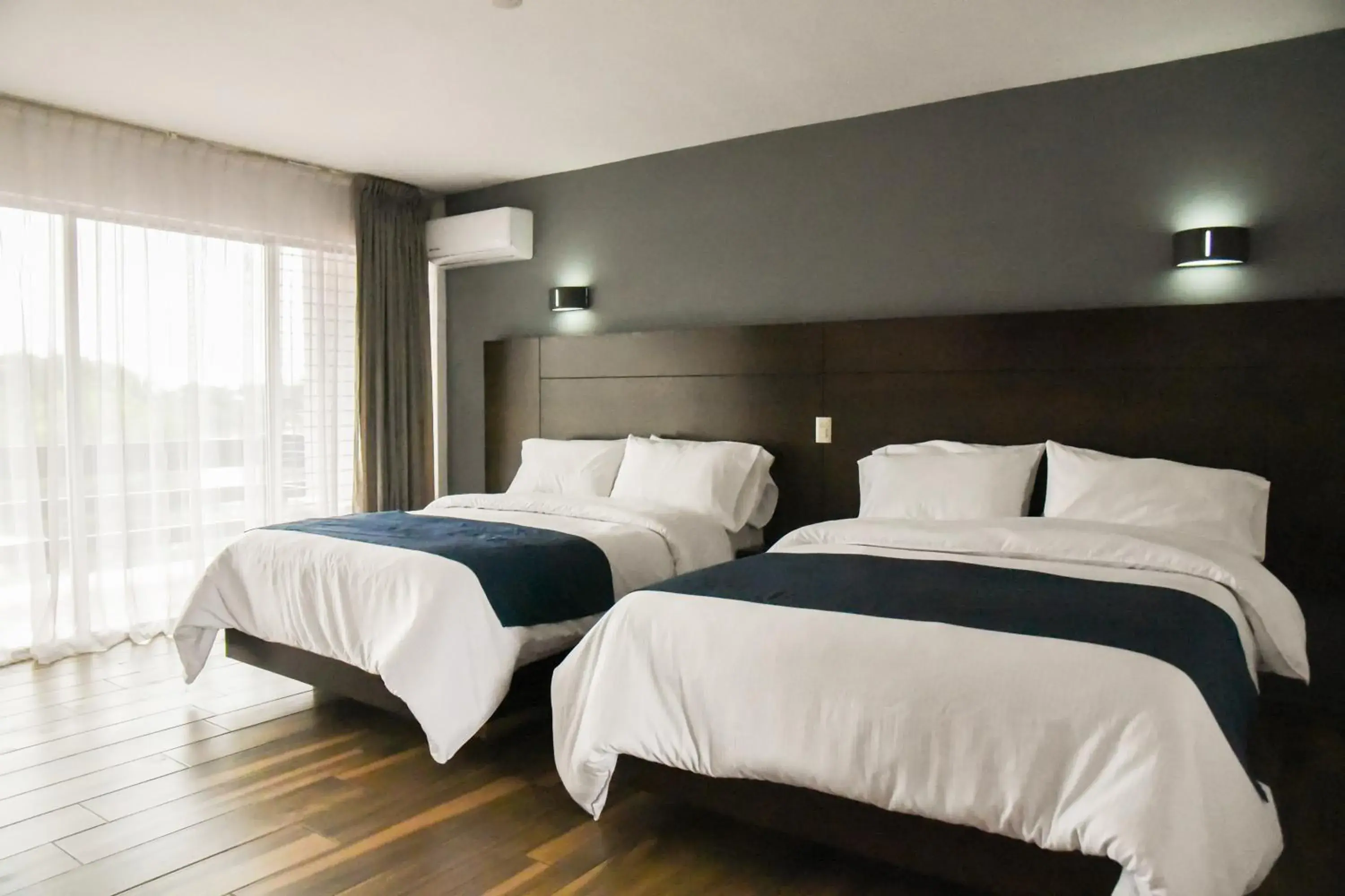 Bedroom, Bed in Hotel Expo Plaza Business and Family Guadalajara Bedroom, Bed in Hotel Expo Plaza Business and Family Guadalajara