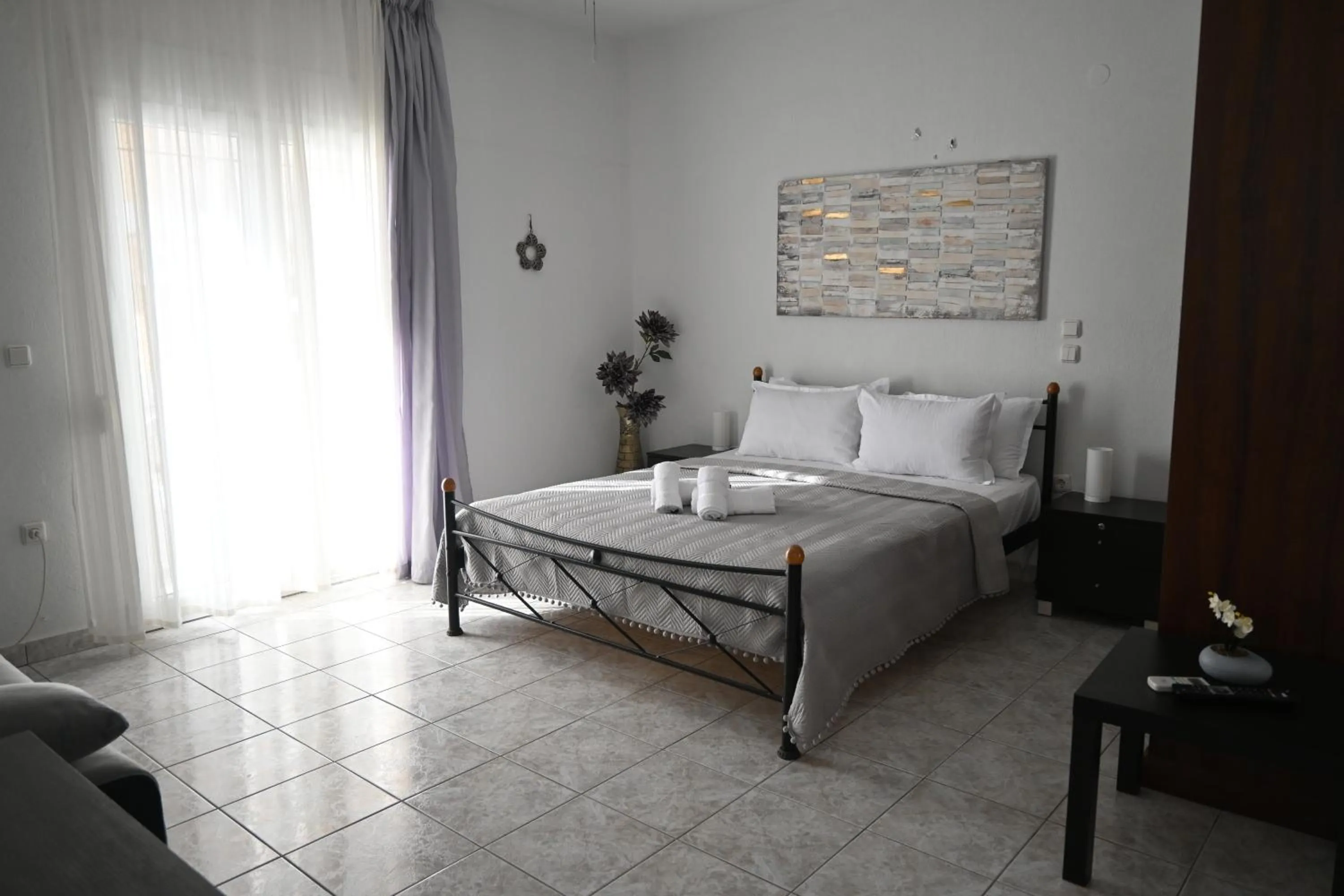 Bed in Doukas Aparthotel