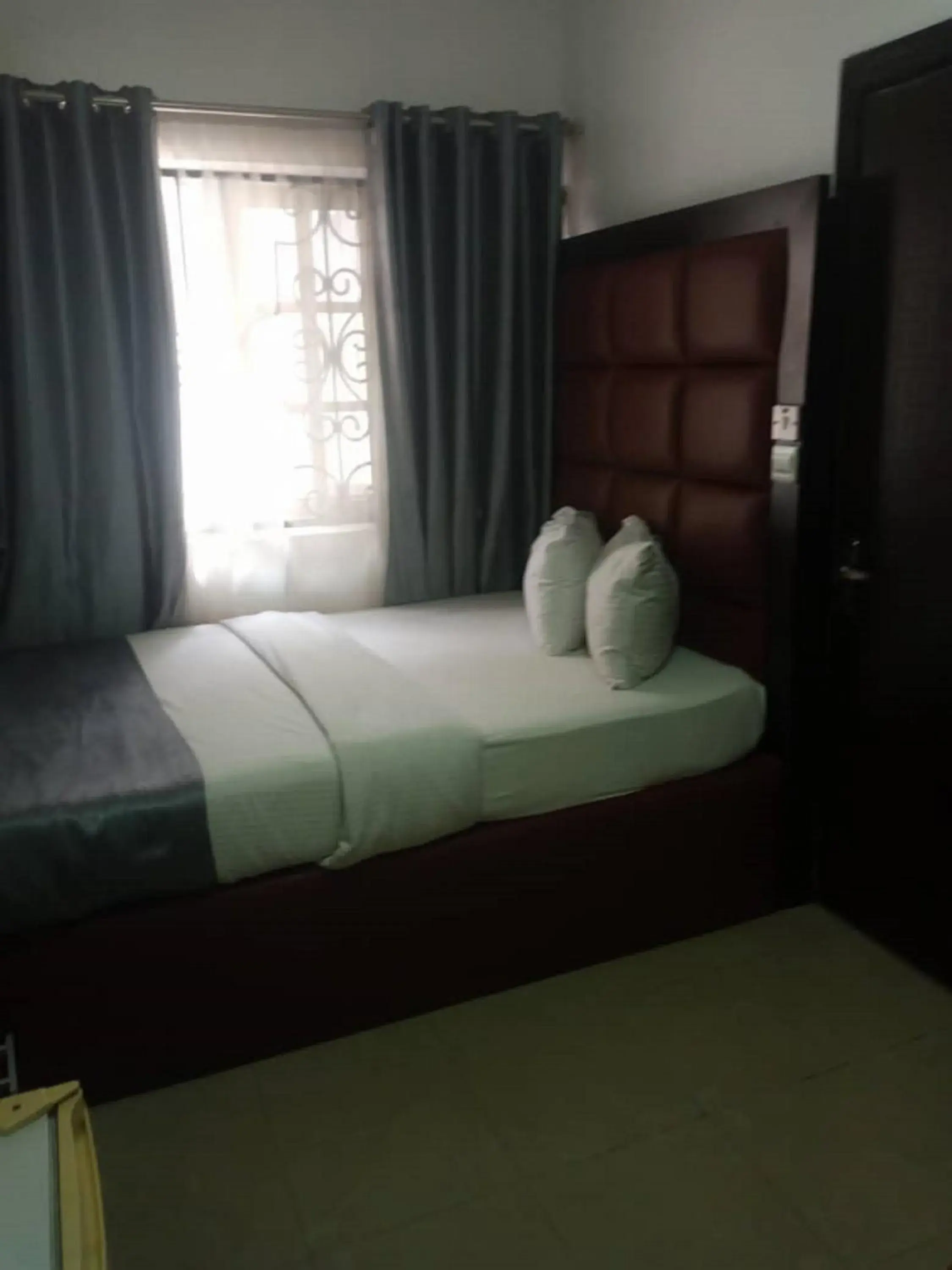 Bed in 4th Apartment and Suites Bed in 4th Apartment and Suites