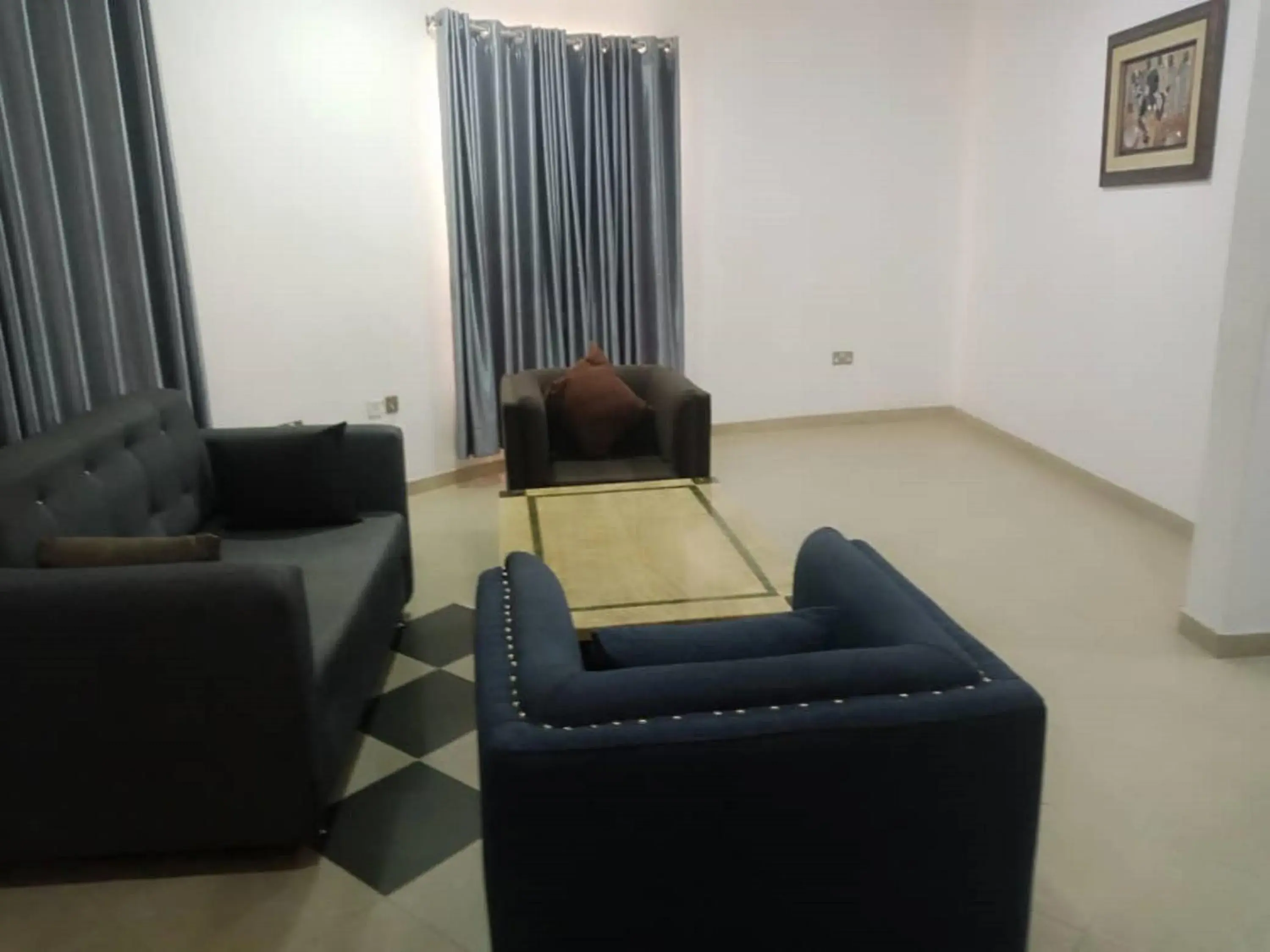 Living room in 4th Apartment and Suites Living room in 4th Apartment and Suites