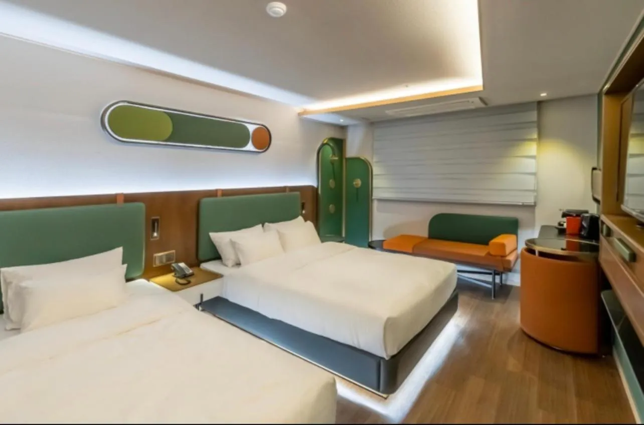 Bed in L&L Central Hotel