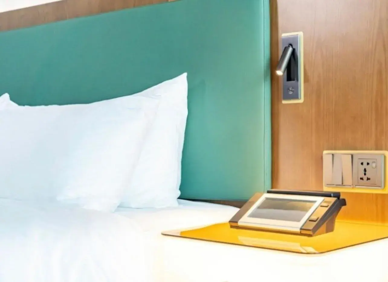 Bed in L&L Central Hotel Bed in L&L Central Hotel