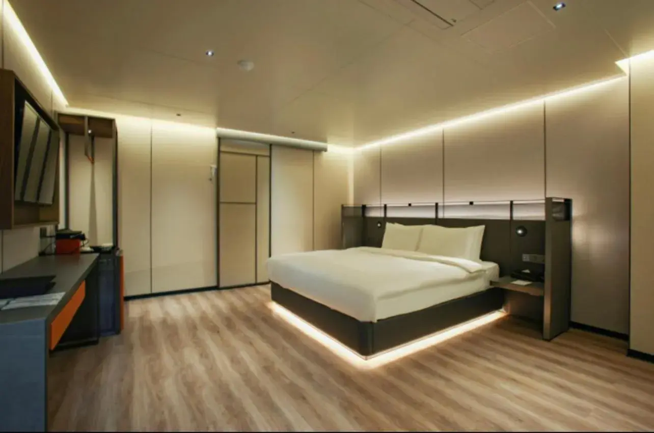 Bed in L&L City Hotel Bed in L&L City Hotel