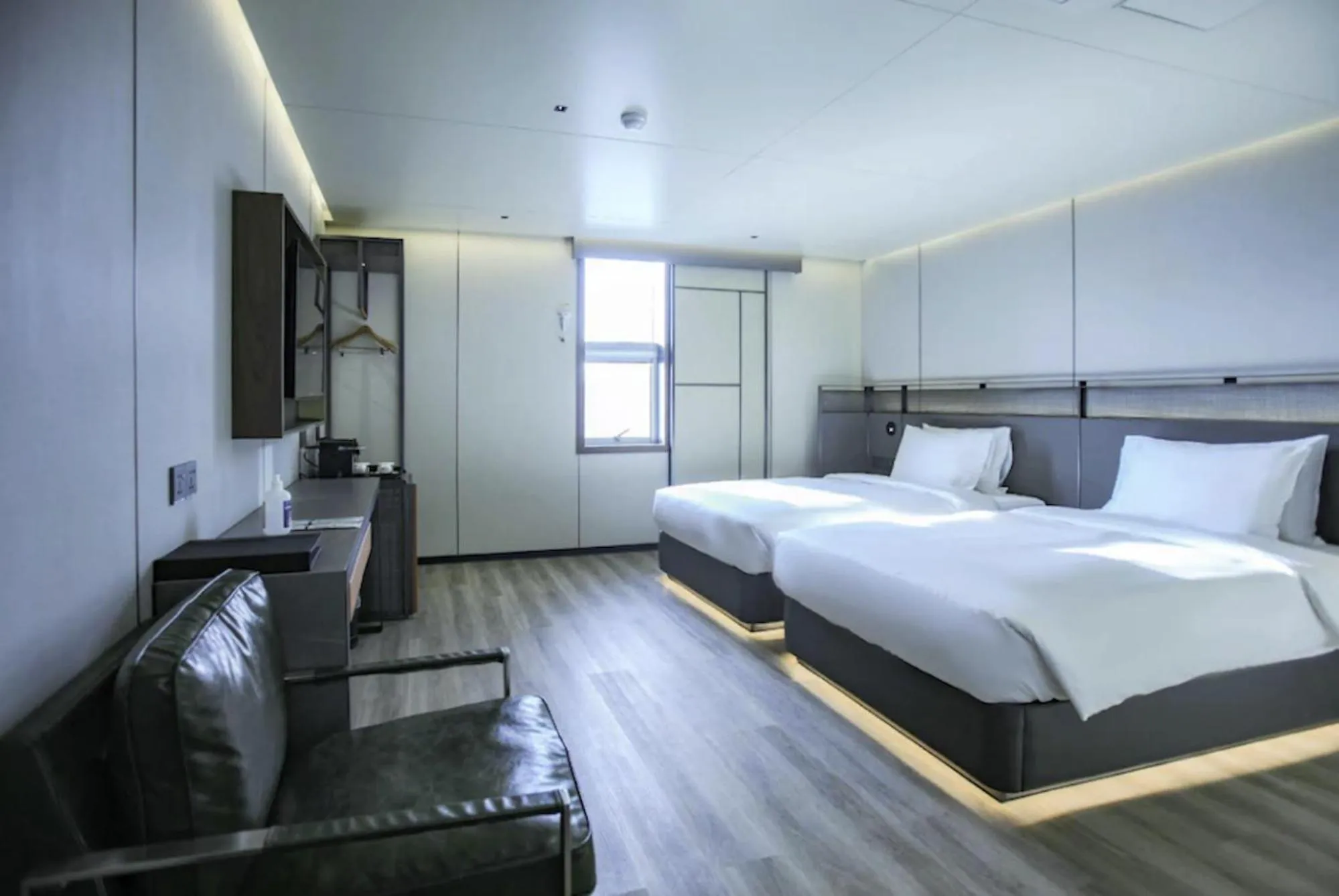 Bed in L&L City Hotel