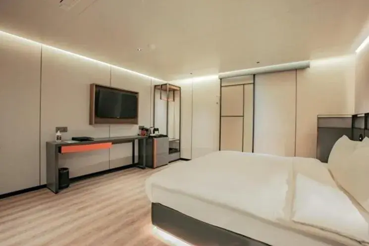 Bed in L&L City Hotel Bed in L&L City Hotel