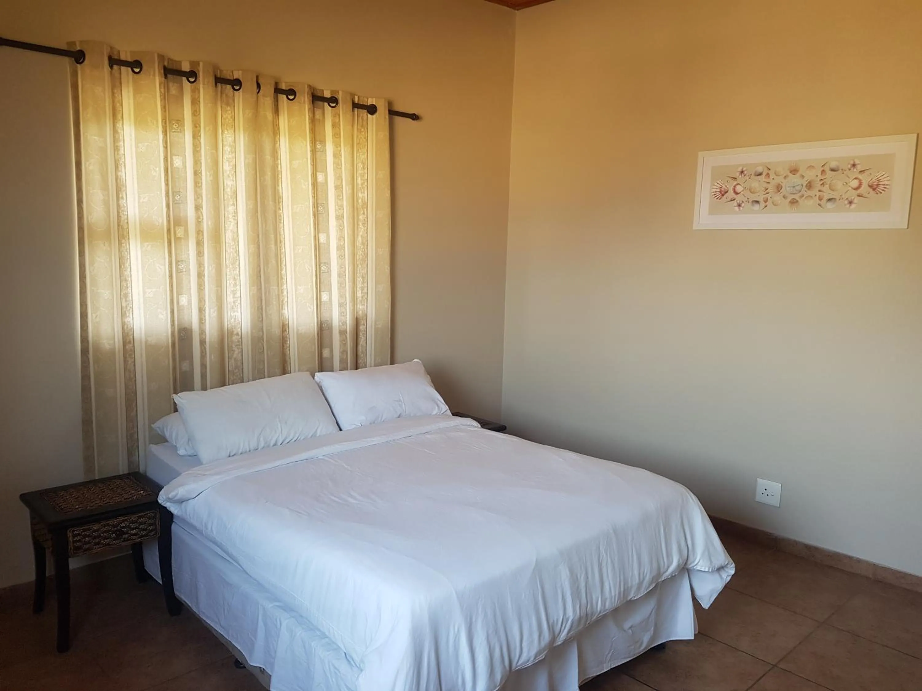 Bed in Golden Dawn Chalets