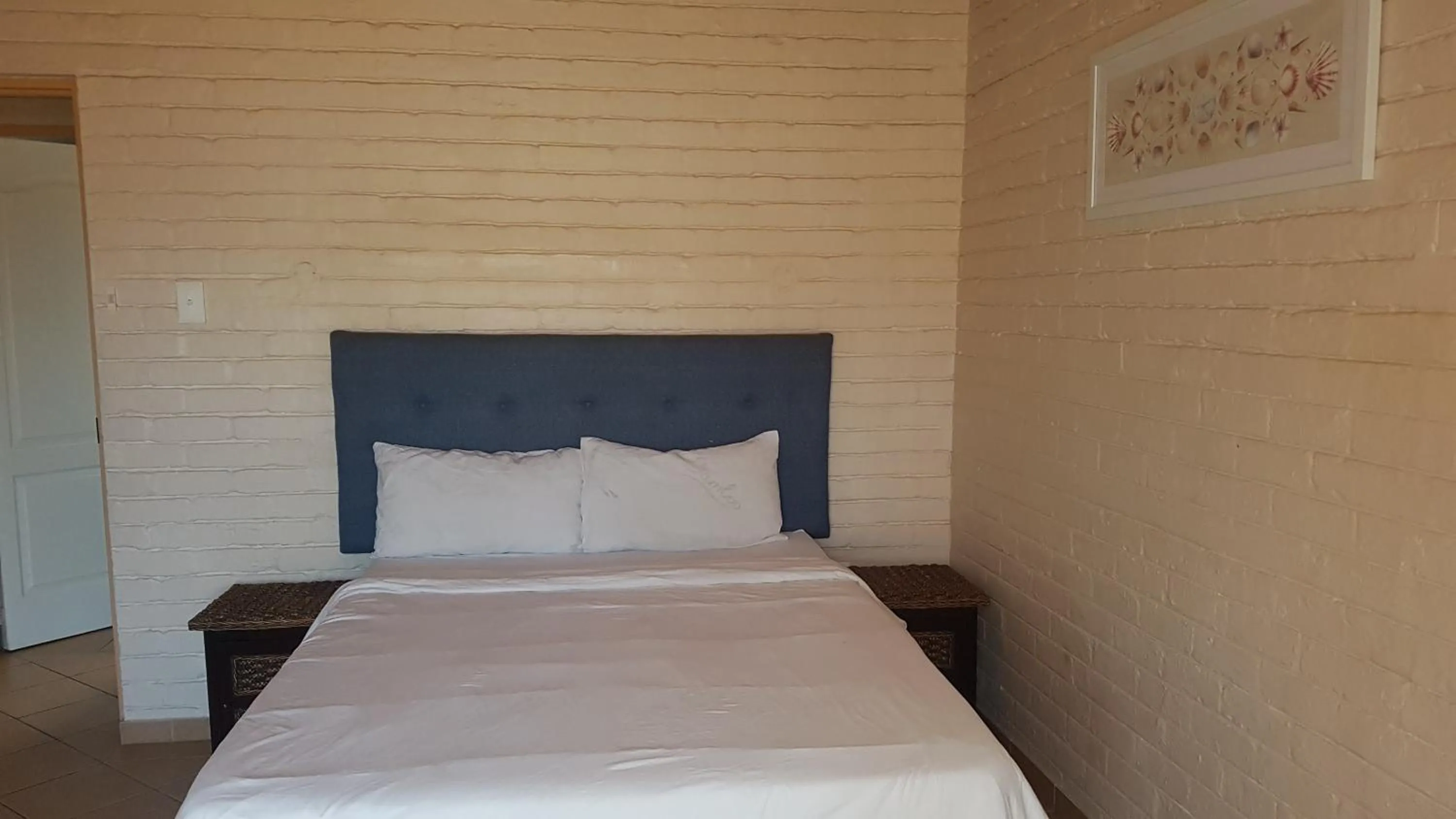 Bed in Golden Dawn Chalets
