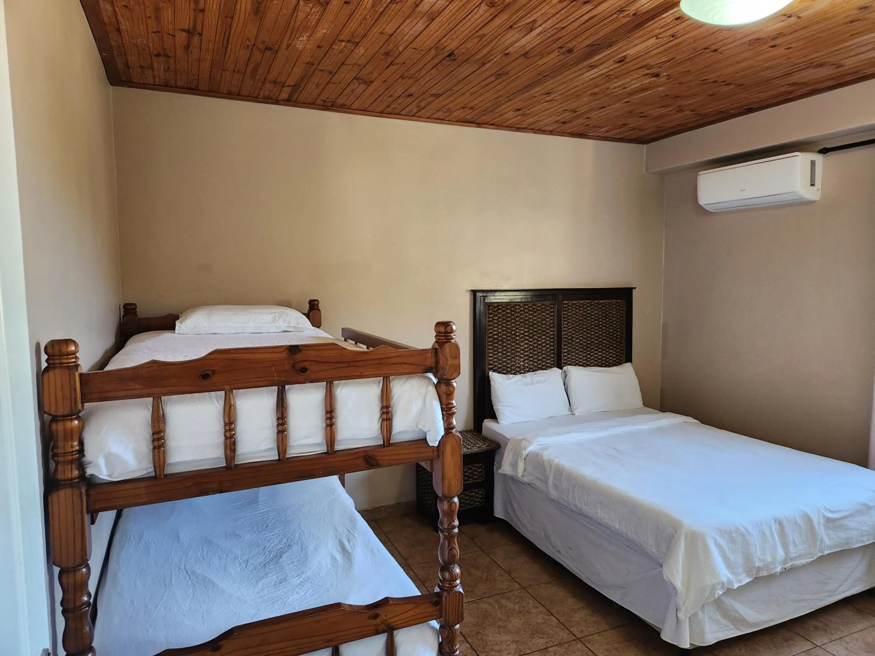 Bed in Golden Dawn Chalets