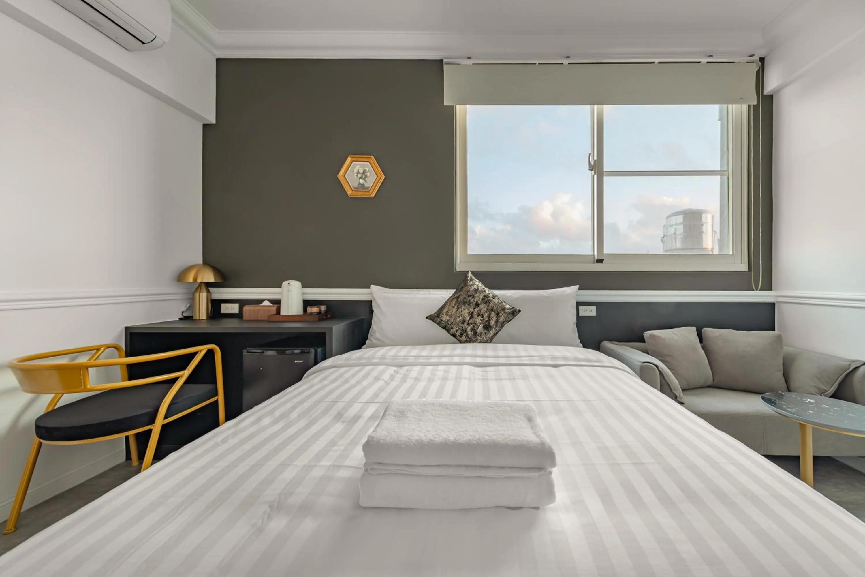 Bed in Sunset Mu Style Inn