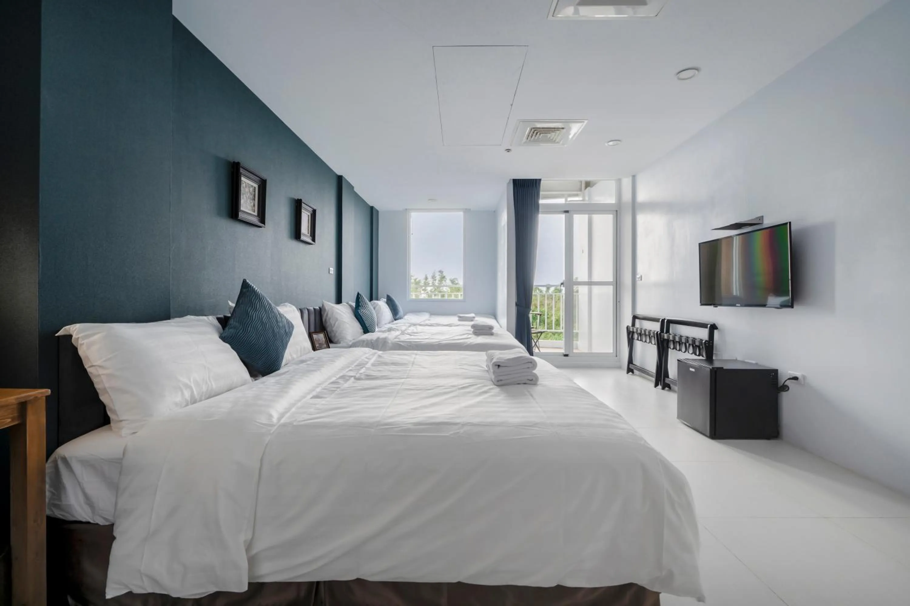 Photo of the whole room, Bed in Sunset Mu Style Inn