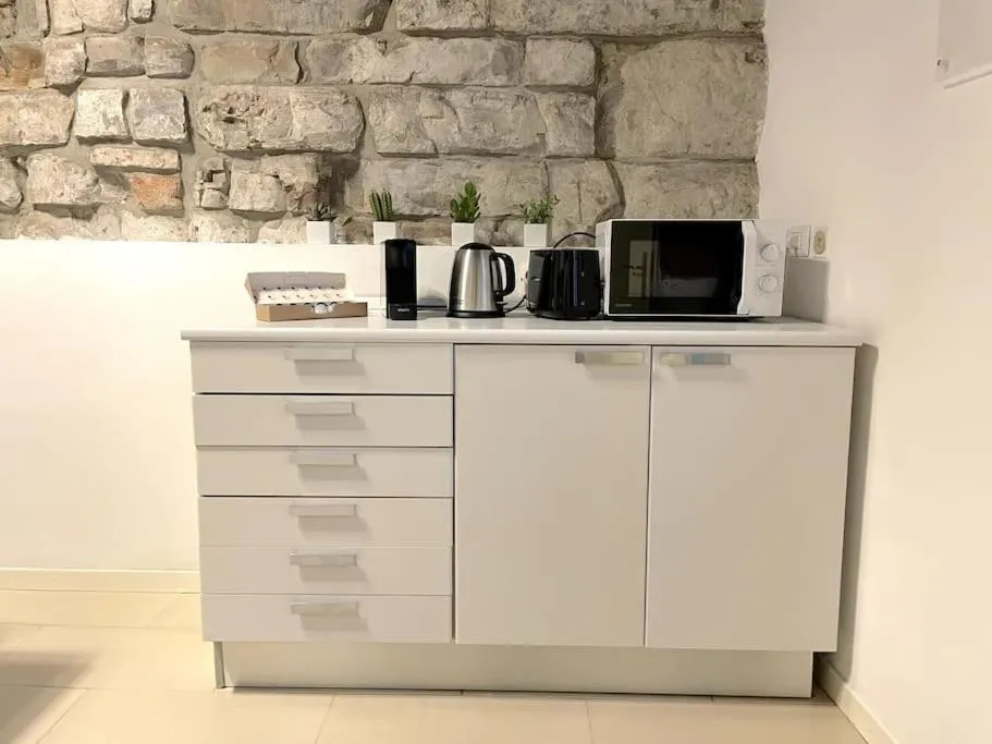 Coffee/tea facilities in Tower Gombito's Apartment