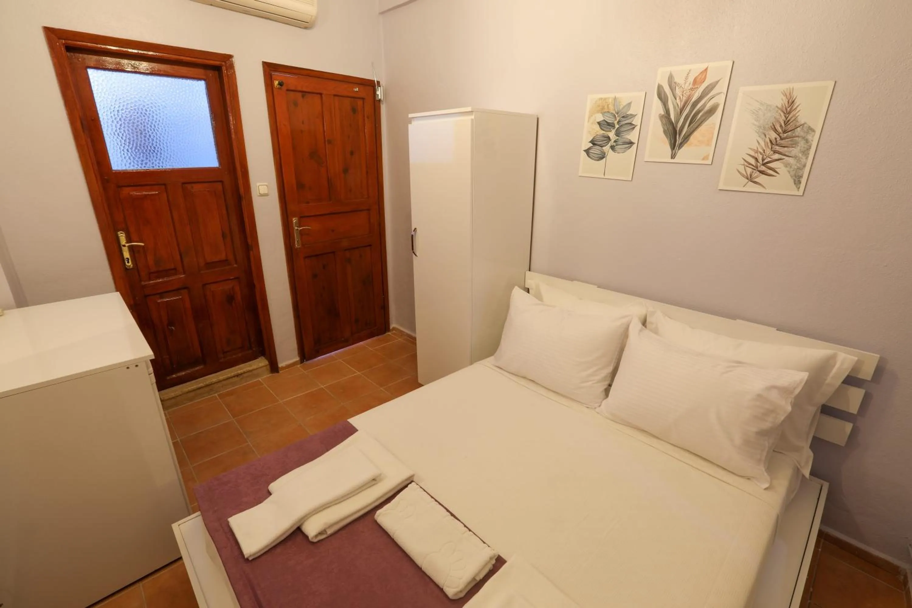 Bed in Cunda Pera Otel